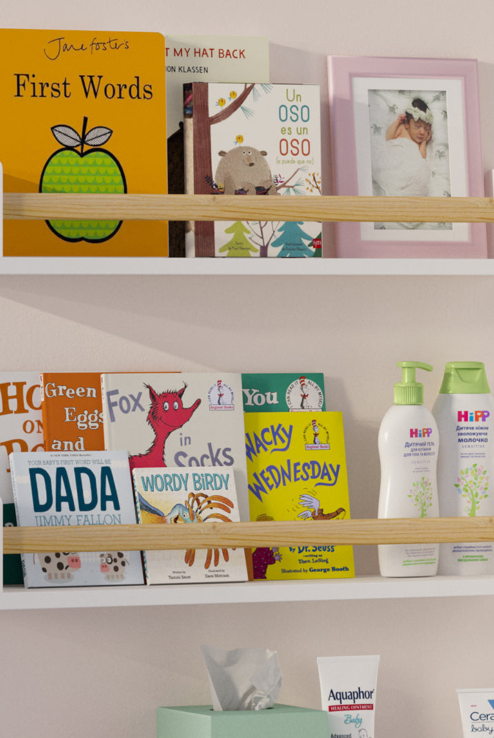 MADRID 24-inch white forward-facing kids book ledges styled in a nursery reading nook