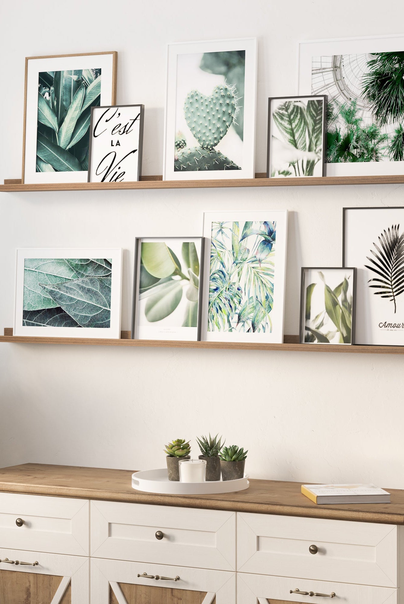 DENVER walnut picture ledge styled with layered art frames in a living room