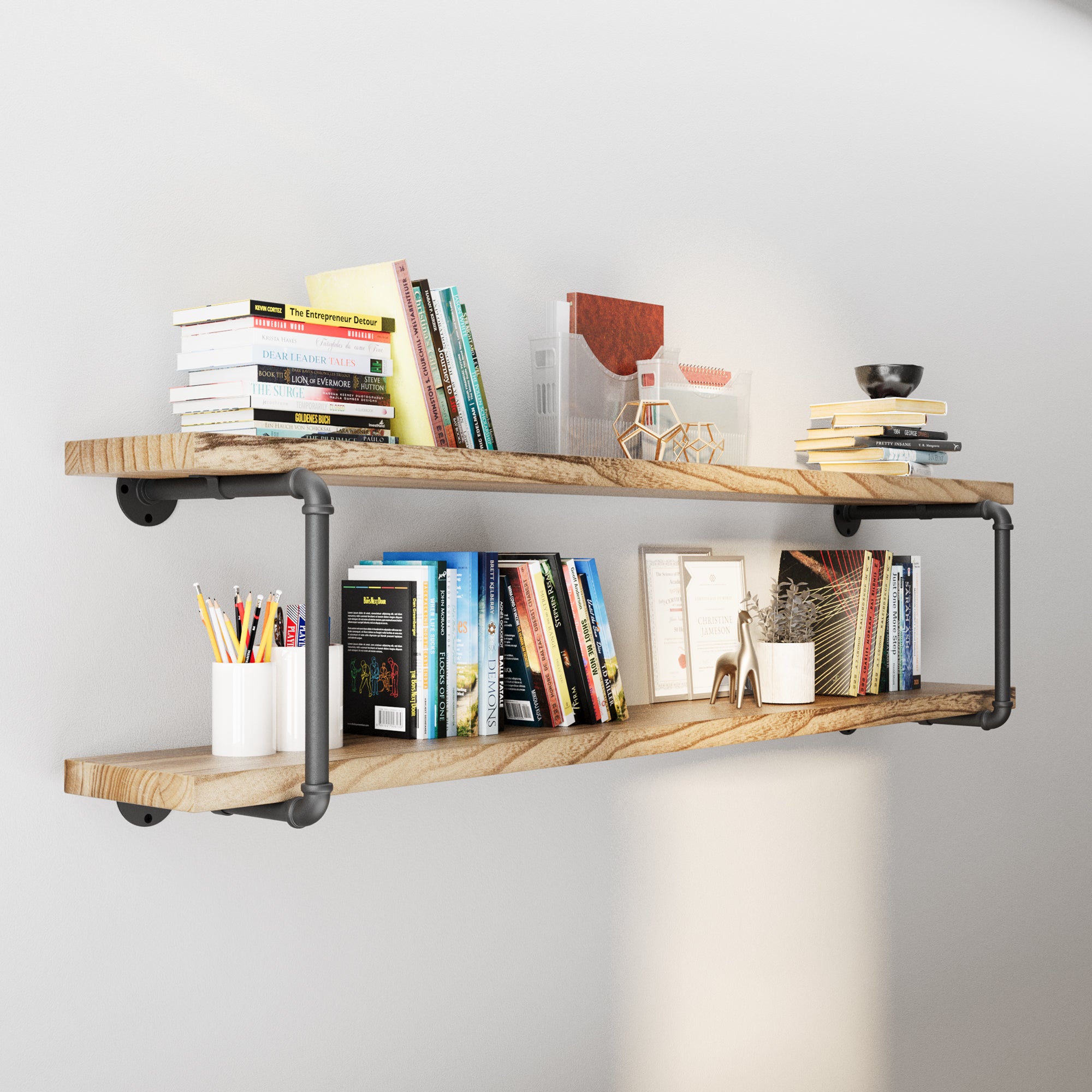60'' floating pipe shelves burnt color filled with books, decor, and office supplies.