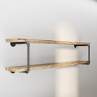farmhouse pipe shelves mounted on a wall