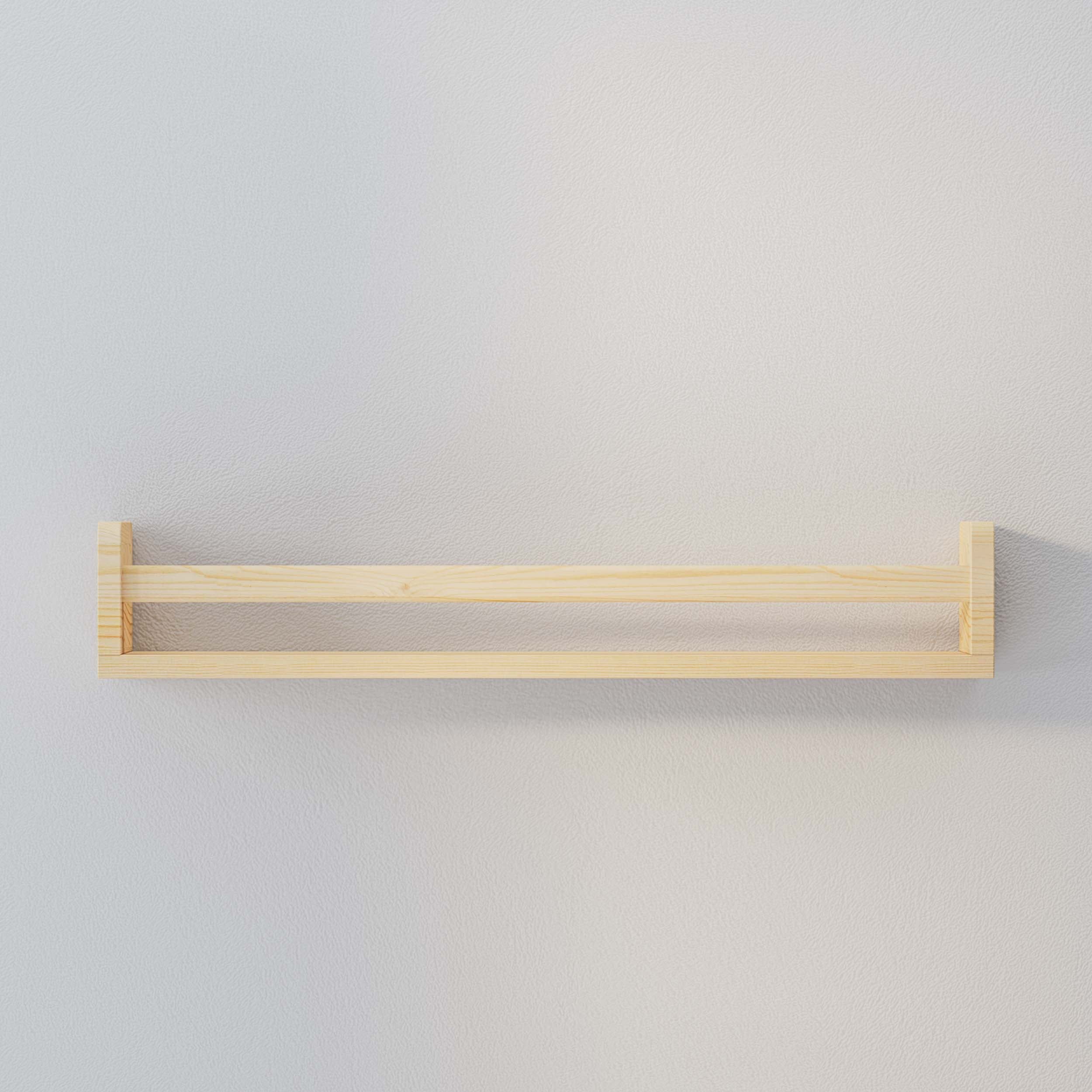 An empty natural book shelf nursery mounted on a light gray wall. Its simple and elegant design makes it versatile for various uses, from holding books to displaying decorative items.