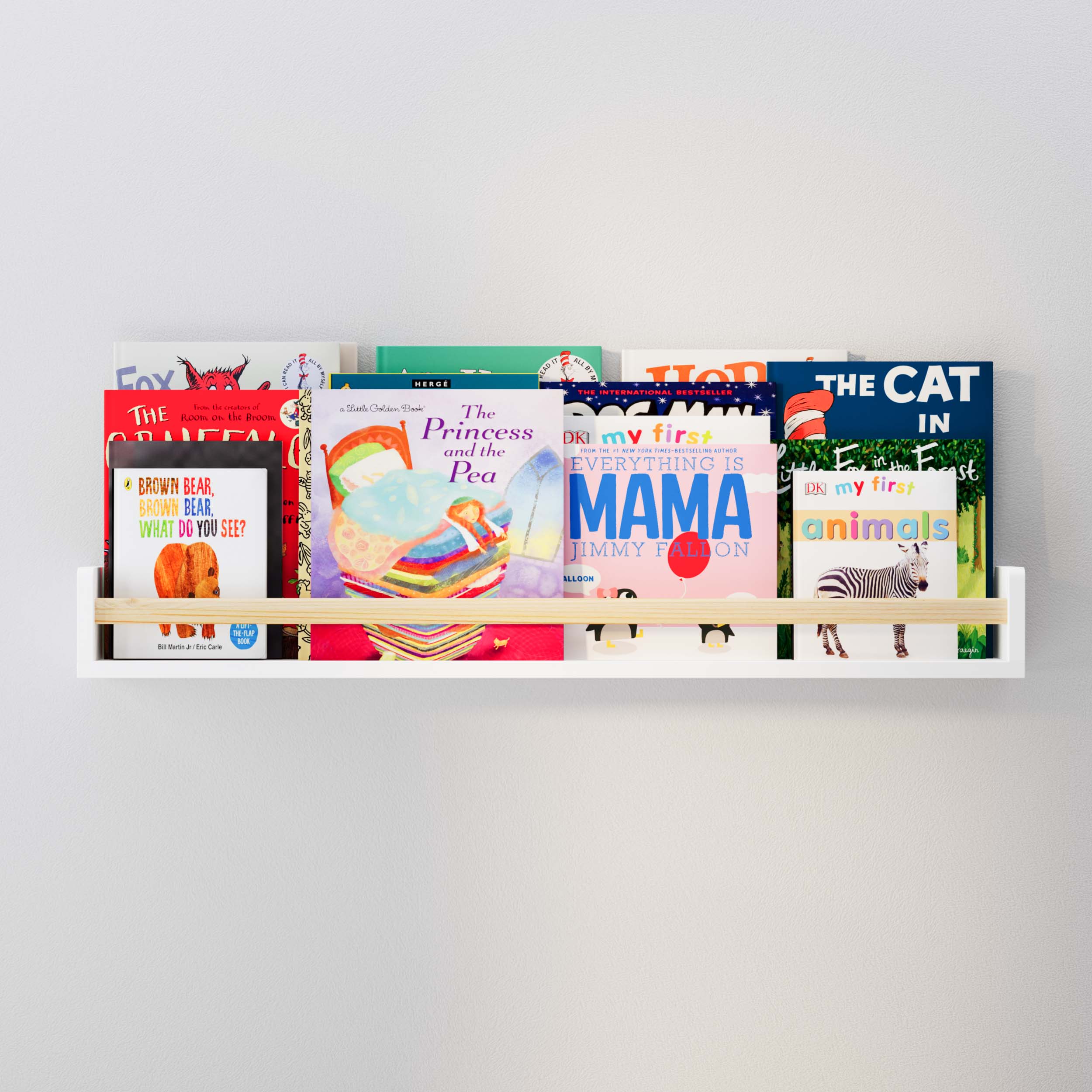 A white wall kids shelf with a natural wood rod filled with children's books, mounted on a light gray wall. The shelf holds colorful book covers, creating an inviting and organized space for young readers.