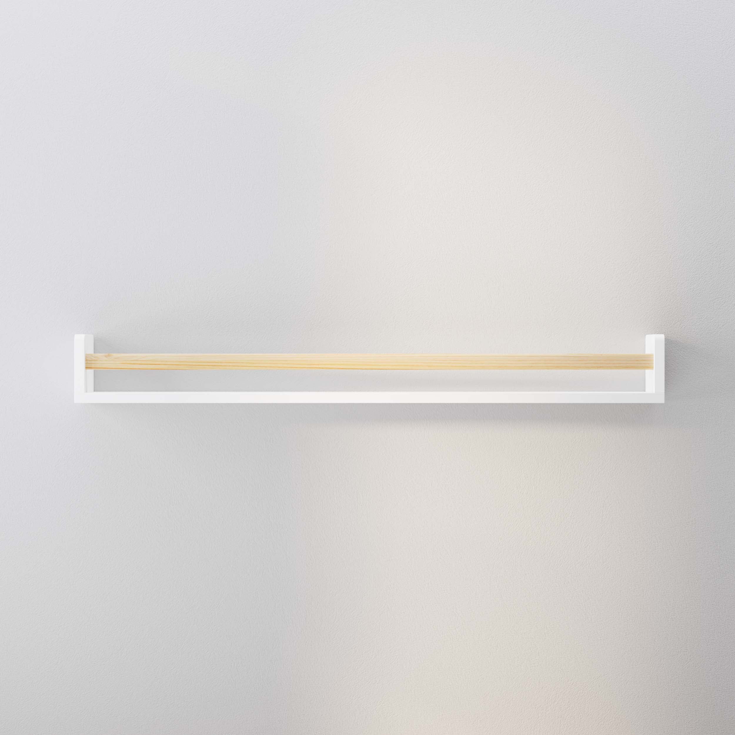 An empty white kids bookshelf with a natural wood rod mounted on a light gray wall. Its simple and elegant design makes it versatile for various uses, from holding books to displaying decorative items.