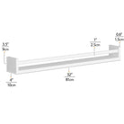White bookshelf for kids room dimensions: 32" x 4" with a depth of 3.5", front lip height of 1", and back height of 0.6".