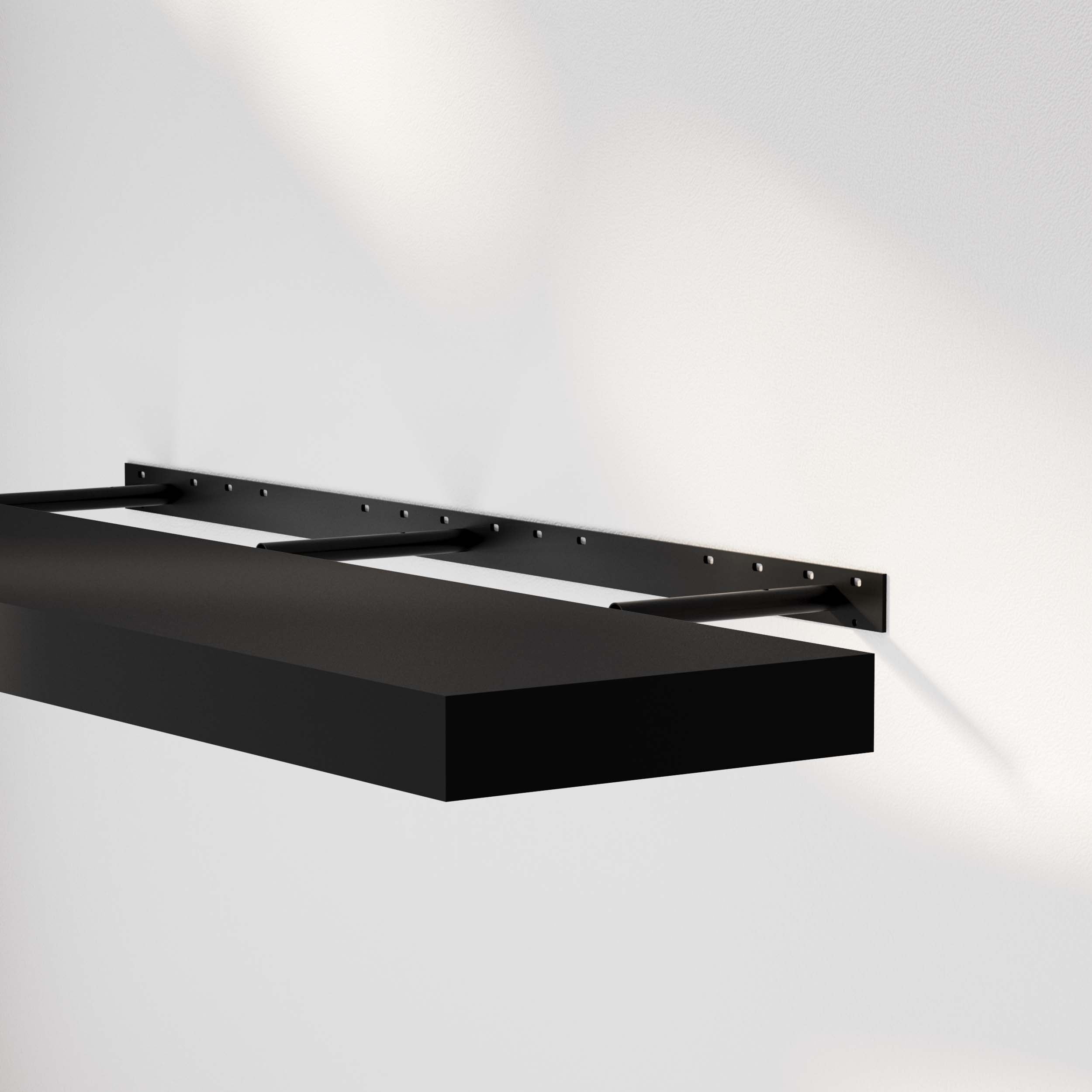 A foating shelf for wall black with an invisible bracket, mounted on the wall, highlighting its sleek design and sturdy brackets.