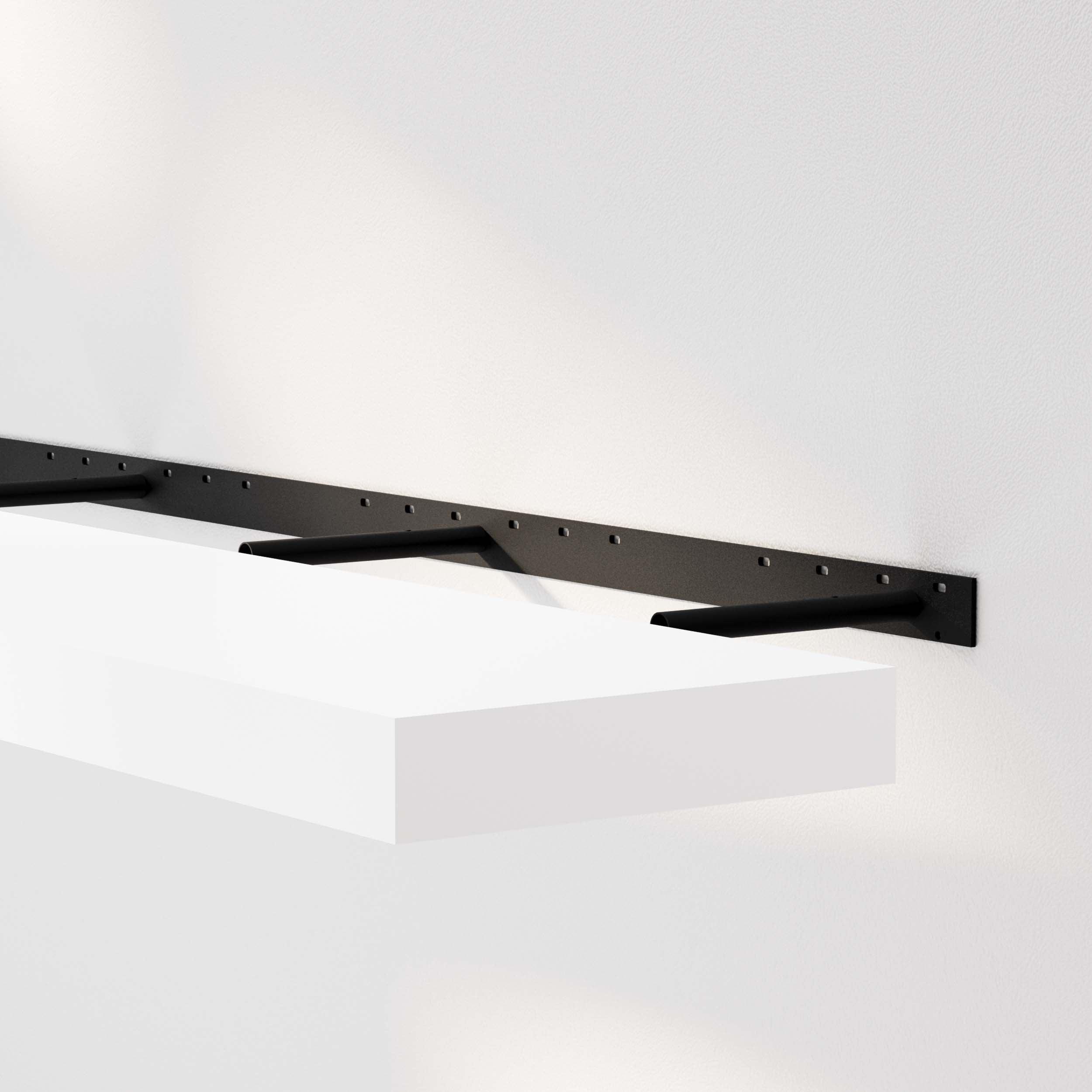 A white foating shelf for wall with a black hidden bracket mounted on the wall, highlighting its sleek design and sturdy brackets.