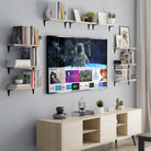 Living room with floating bookshelves supported by black industrial I metal brackets, displaying books and decor items.