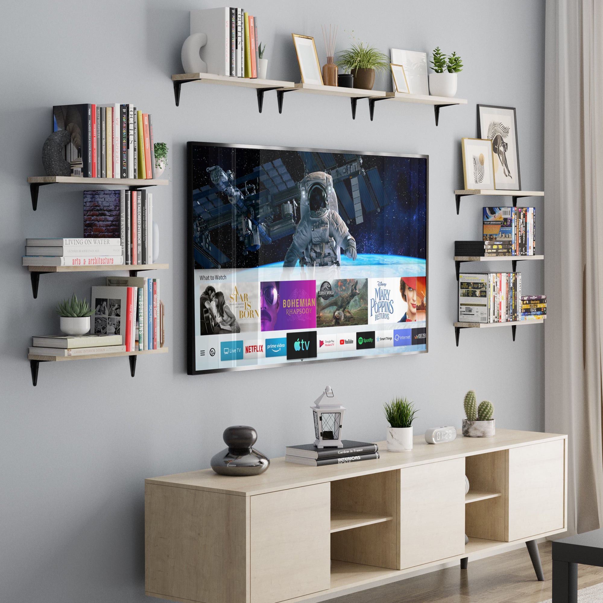 Living room with floating bookshelves supported by black industrial I metal brackets, displaying books and decor items.