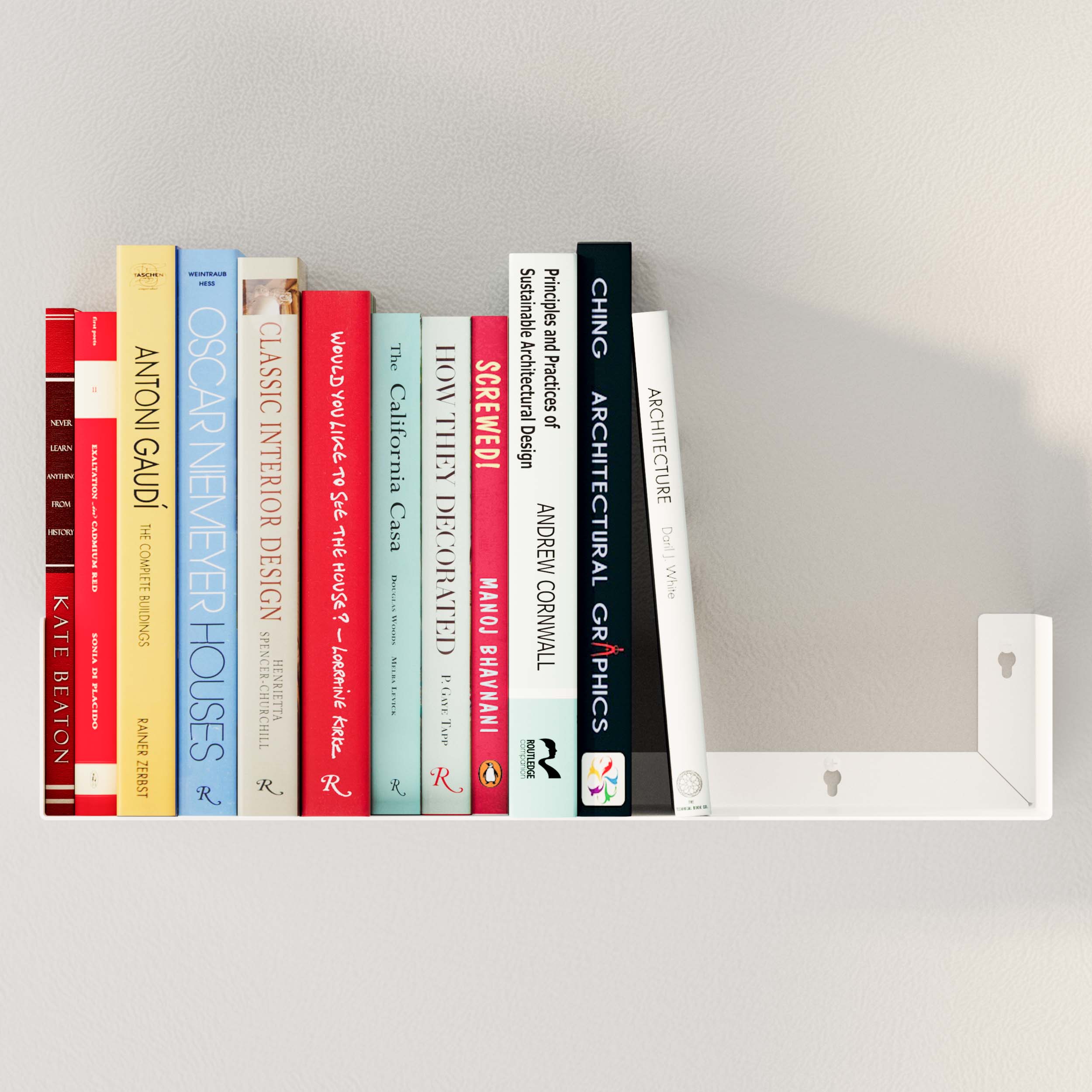 Showcase your colorful book collection stylishly with this white metal U-shaped bookshelf. Durable and chic, it fits perfectly in any home decor. 