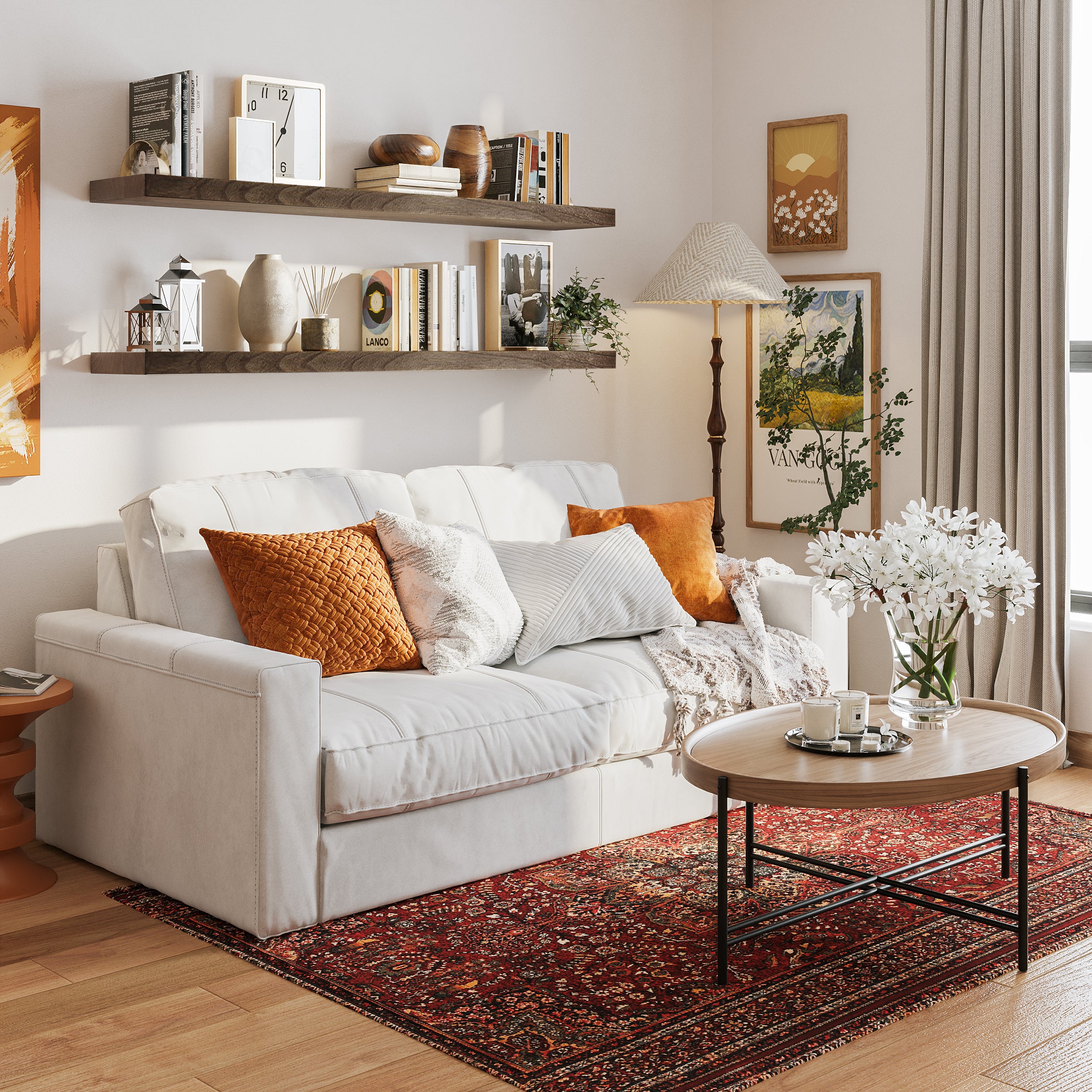 Two 60 inch long floating book shelves with invisible brackets in a dark walnut finish styled with books and vases over a cozy white couch. Warm tones and framed art create a welcoming living room aesthetic.