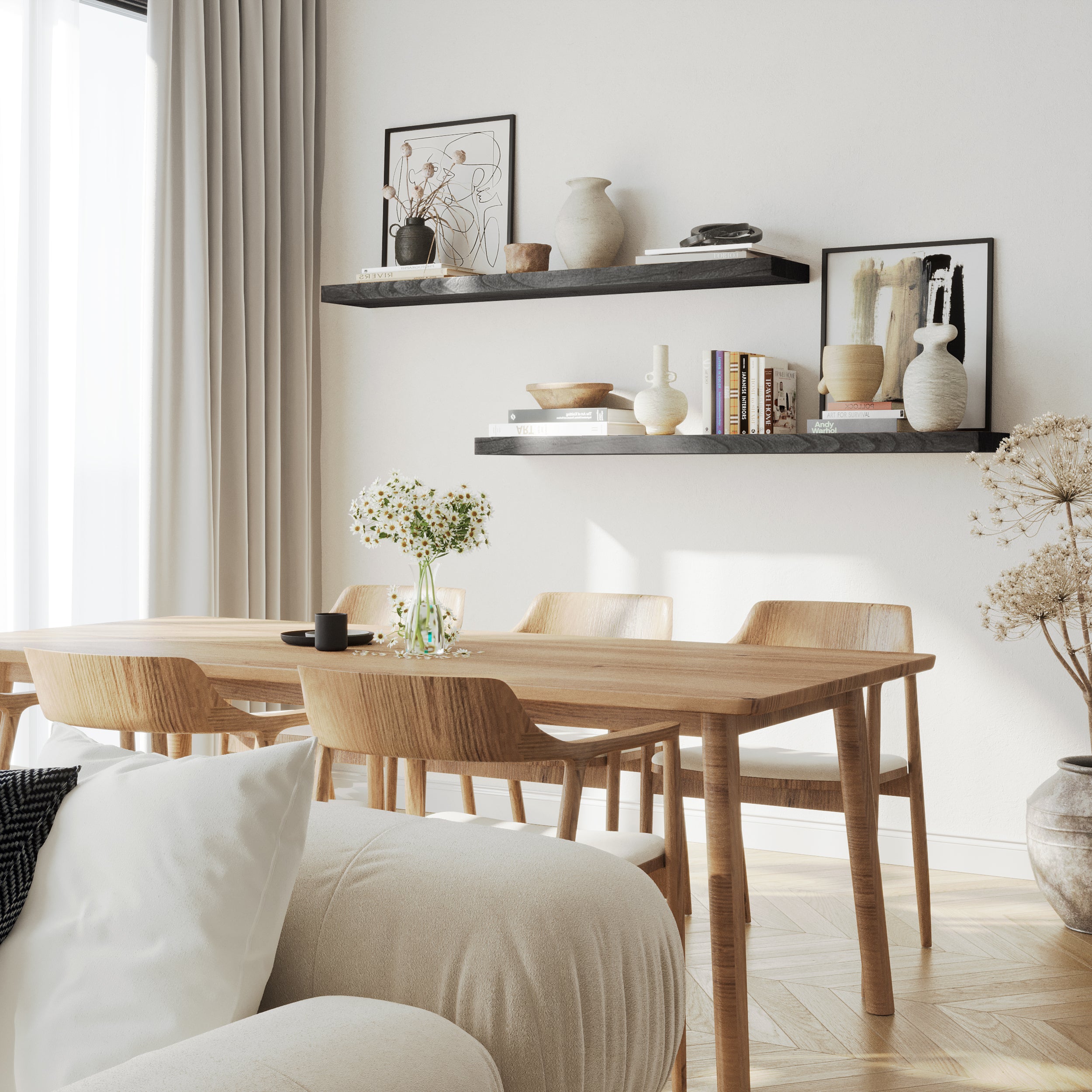 A pair of 60 inch long wall book shelves with invisible brackets in ebony finish styled with neutral decor, enhancing a minimal dining space with clean lines and soft natural lighting.