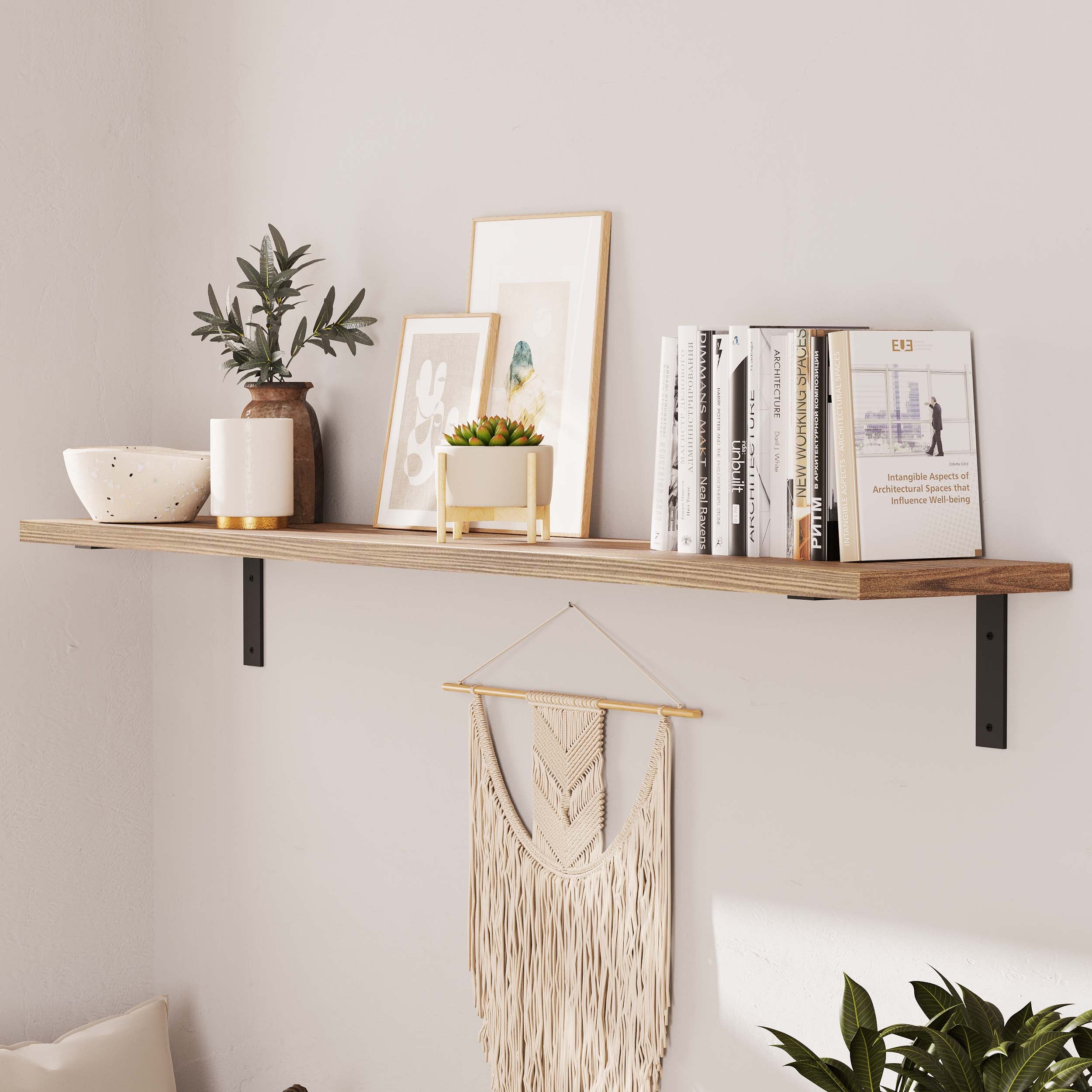 A 60 inch display shelf adorned with natural accents like plants and art, demonstrating its versatile use for decor and storage.