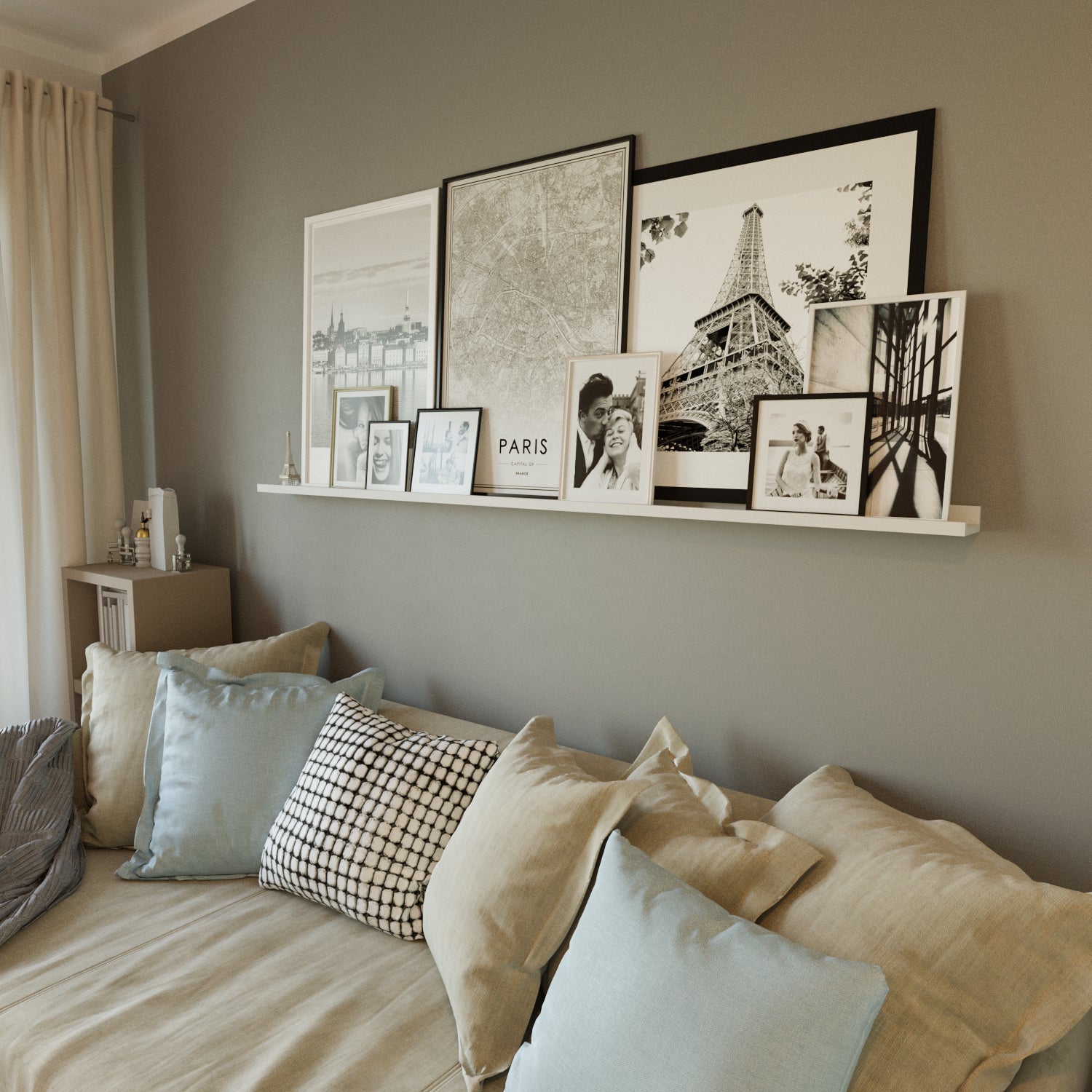 White shelf for wall with various frames above a bed in a bright room.