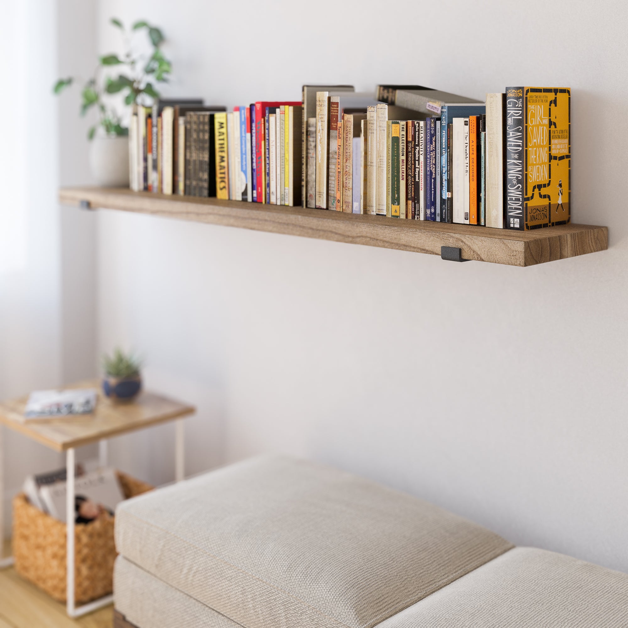 A single rustic storage shelf filled with books, offering a sleek and compact solution for extra storage, blending function with minimal aesthetics.