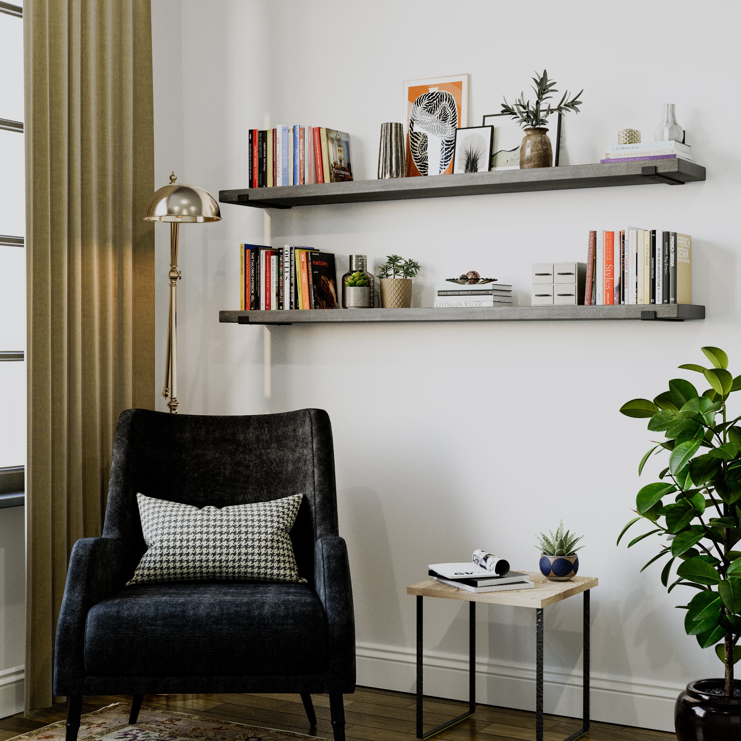 Two "Classic Gray" long boho shelves in a modern reading nook. The shelves are filled with books and decorative objects. A plush black armchair and a gold floor lamp complete the warm and inviting setting.