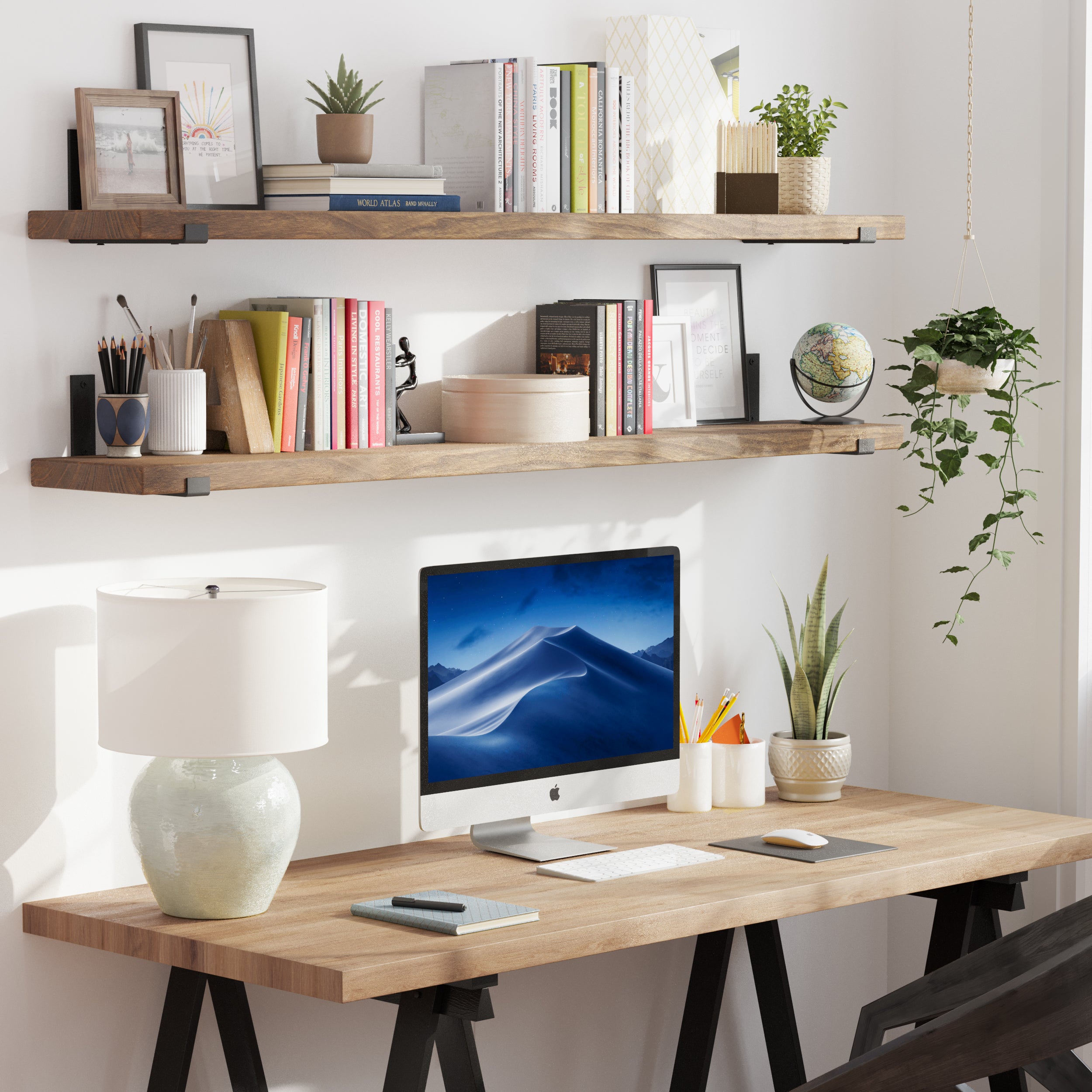 Two provincial floating storage shelves in rich rustic finish placed above a work desk, filled with books, plants, and office essentials, creating a functional yet aesthetic workspace.