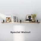 A single wall-mounted shelf in a light walnut finish, styled with neutral-toned books, vases, a framed artwork, and small home accessories. Simple yet elegant for modern interiors.