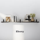 Ebony wooden shelf with black metal brackets, styled with modern books, ceramic vases, and minimal décor for a sleek, contemporary aesthetic.