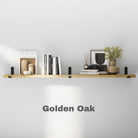 Golden Oak floating shelf styled with books, vases, and decor. Bright natural tone offers warmth and blends effortlessly with light wall backgrounds.