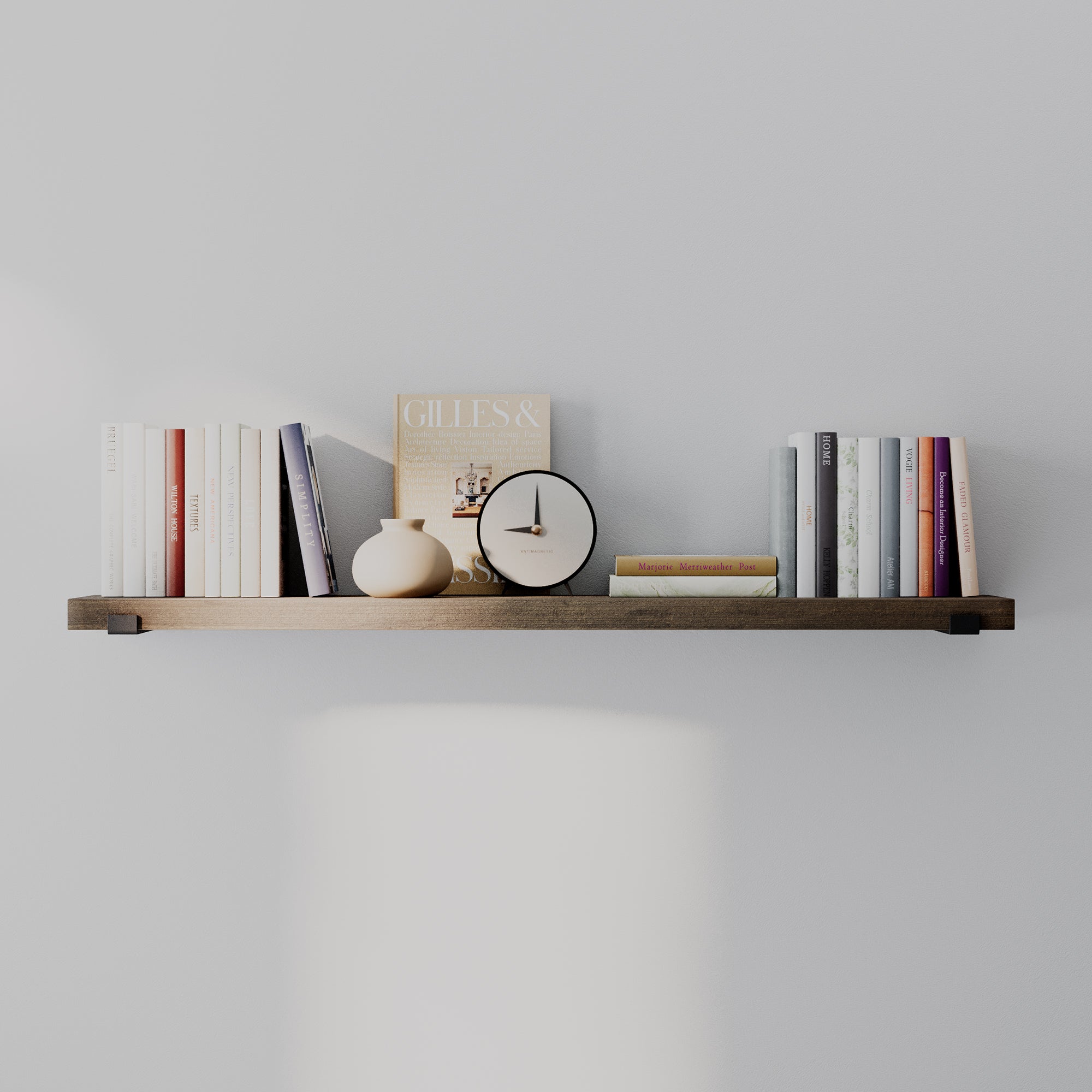 A single farmhouse shelf in dark walnut finish with books, clock, and décor. Clean, balanced composition emphasizes long length, sleek brackets, and modern home styling.