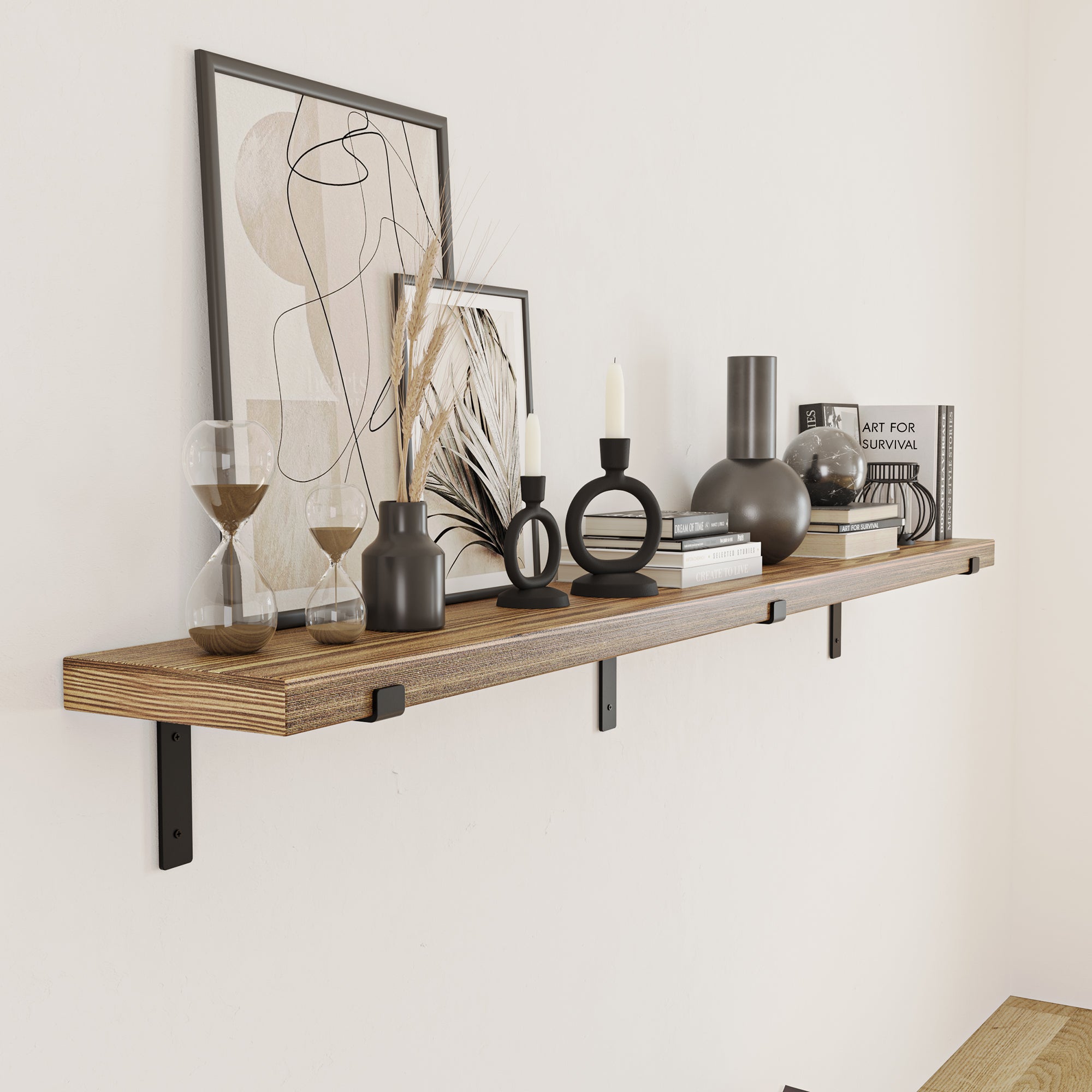A single hanging shelf for wall with black brackets featuring a minimalist black-and-white theme. Modern abstract artwork, black décor elements, books, and sculptural candle holders create an elegant, sophisticated display.