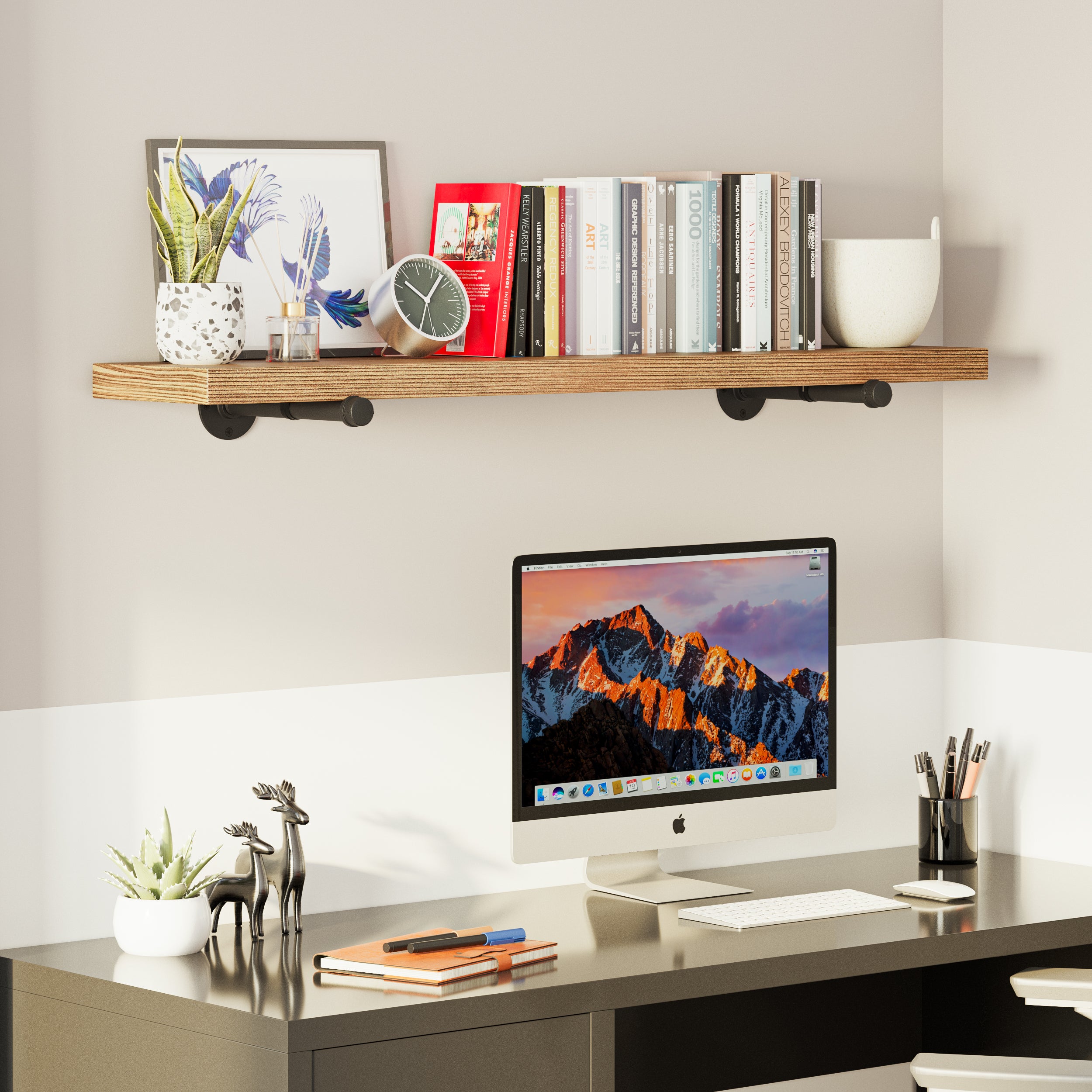 A 48 inch office storage shelf above a desk, styled with books, decor, and a clock, creating a functional workspace.