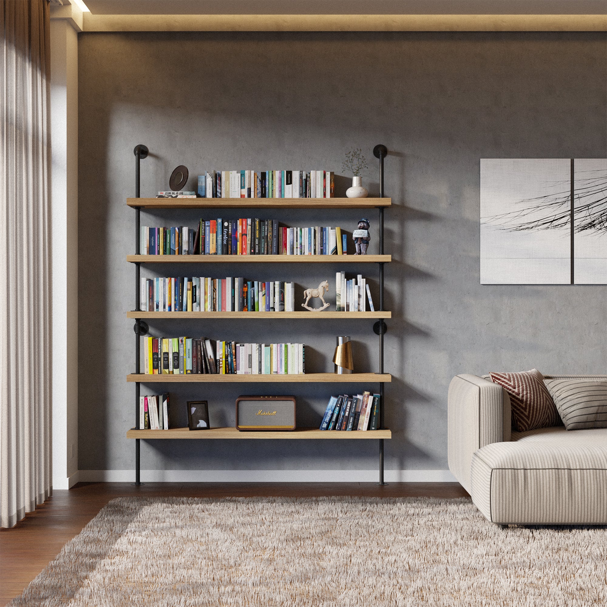 5 ther and 60 inch long pipe shelves with books and decorative items against a gray wall with a sofa and abstract art.