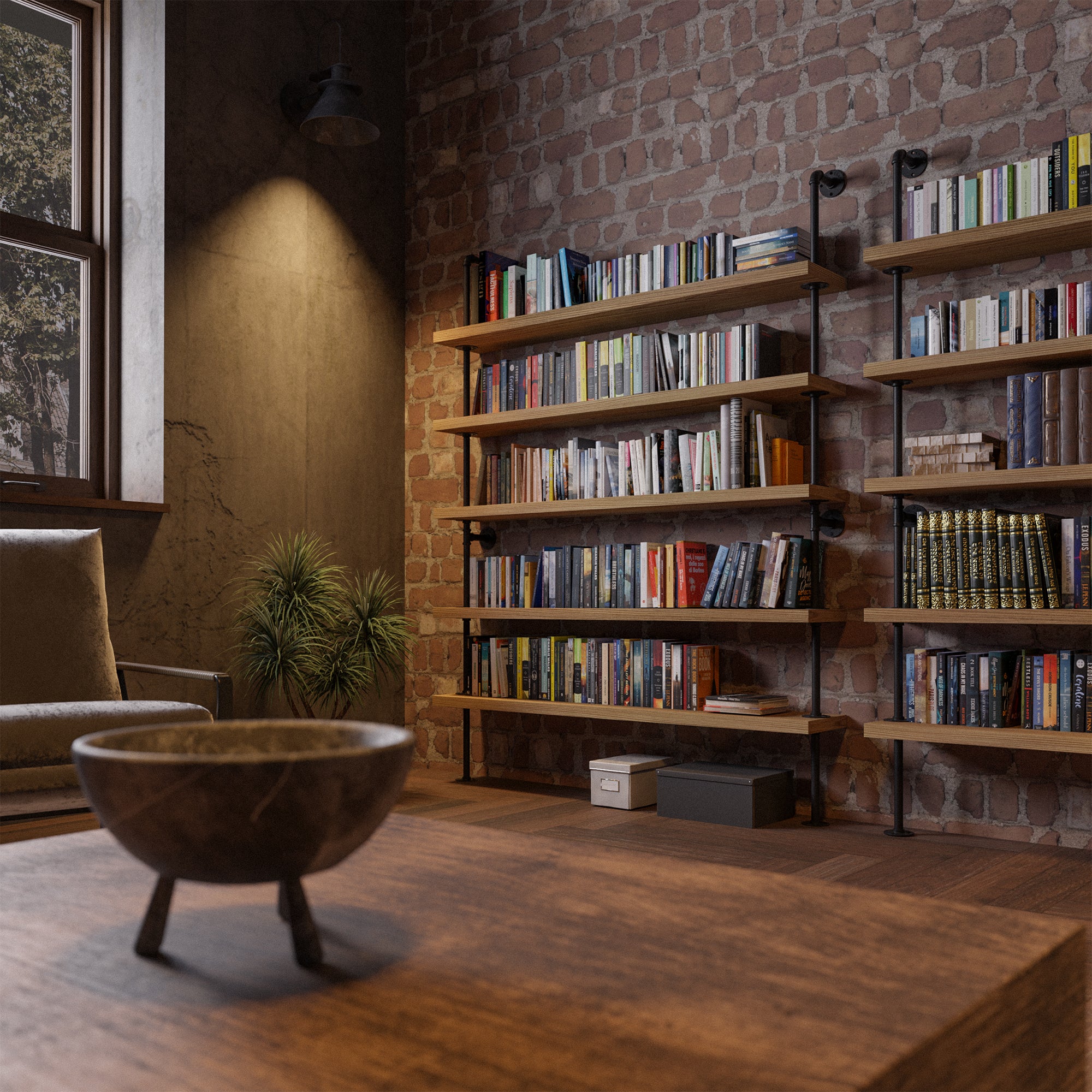 Nestled corner of a room with wooden bookshelves with pipe brackets filled with books, a chair, and a plant against a brick wall.