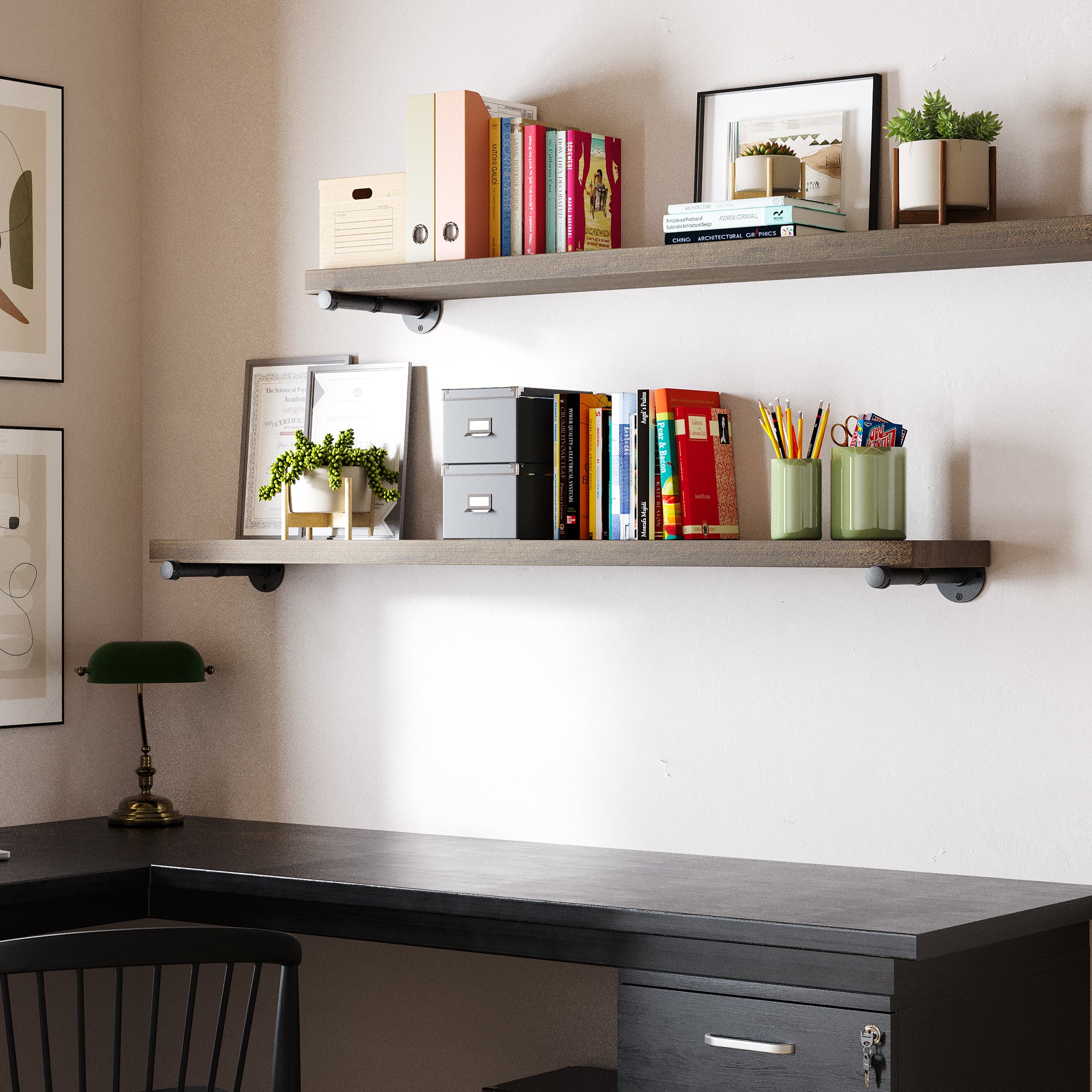 Two 60" black pipe bracket shelves in a rich dark walnut finish in a home office setup, offering stylish wall-mounted storage for books, organizers, and décor. Industrial pipe shelving design blends rustic wood with modern workspace organization.