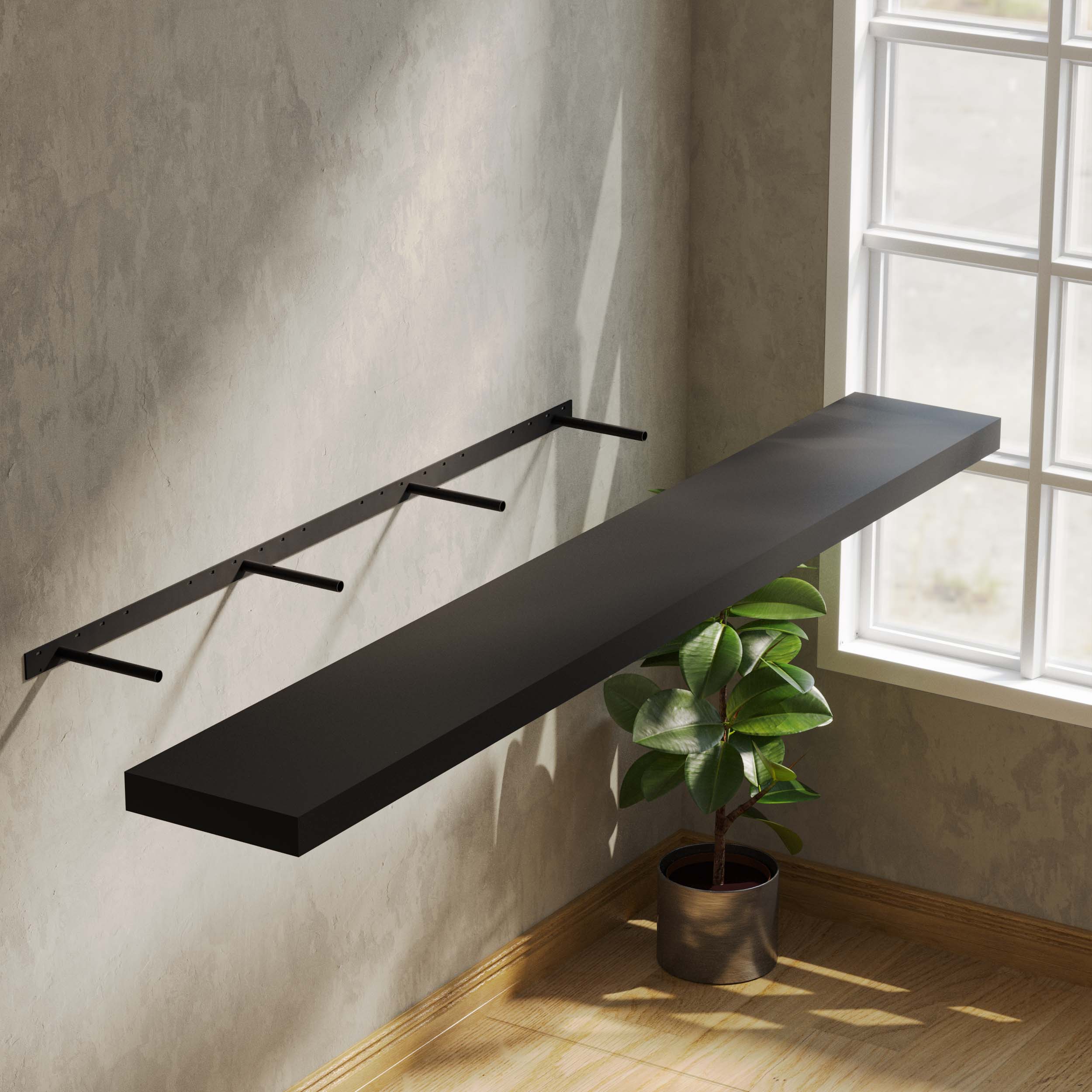 Installation view of a black shelf with a hidden bracket, showing its seamless floating design and sturdy, concealed support.