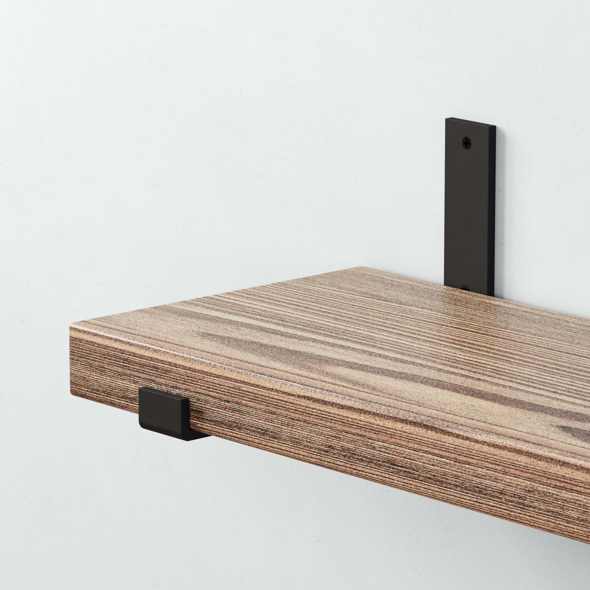 A close-up of a shelf with a metal bracket for sturdy wall mounting, highlighting modern shelving solutions.