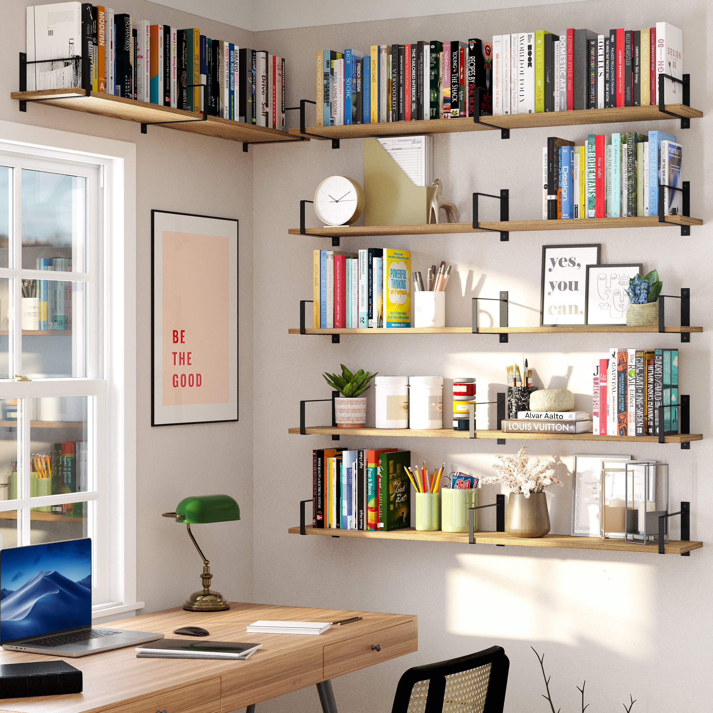 A stylish office space with multiple wall-mounted office shelves wrapping around the corner, filled with colorful books, decorative elements, and motivational wall art, enhancing productivity and organization.