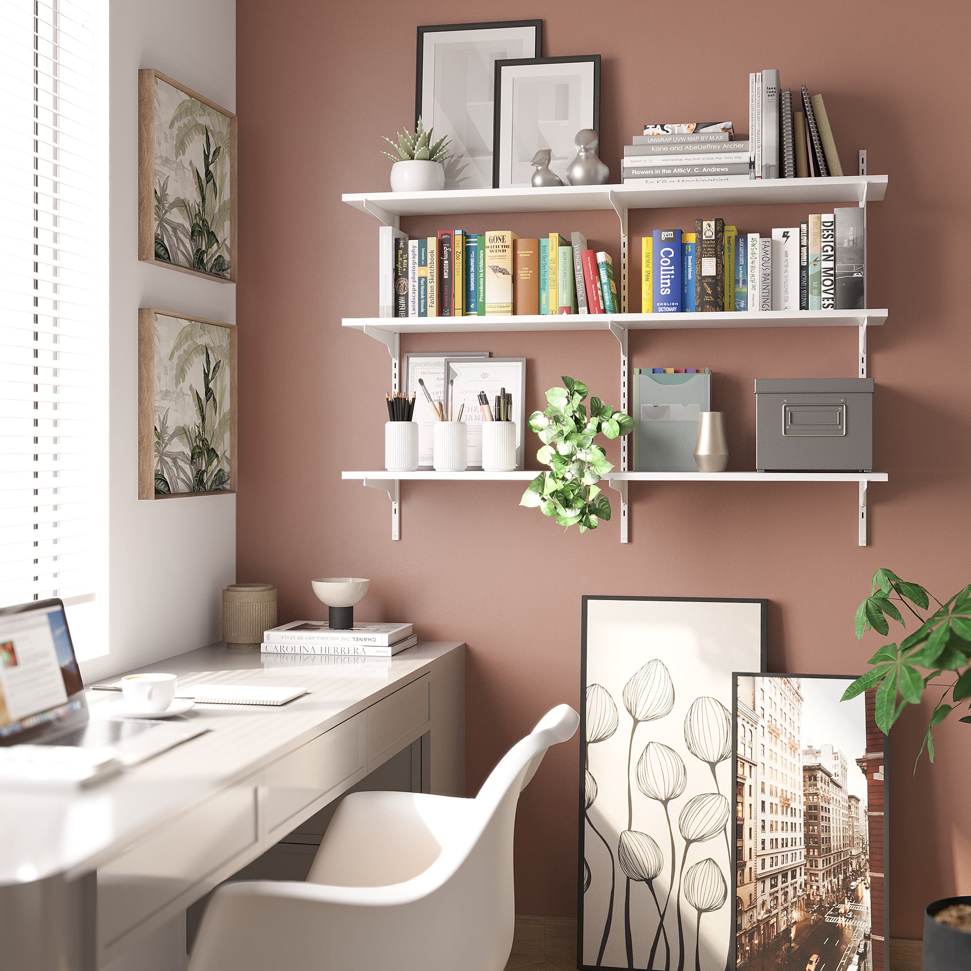 A workspace setup with books and storage items on the office storage shelf with adjustable brackets, blending utility and style above a modern desk setup.