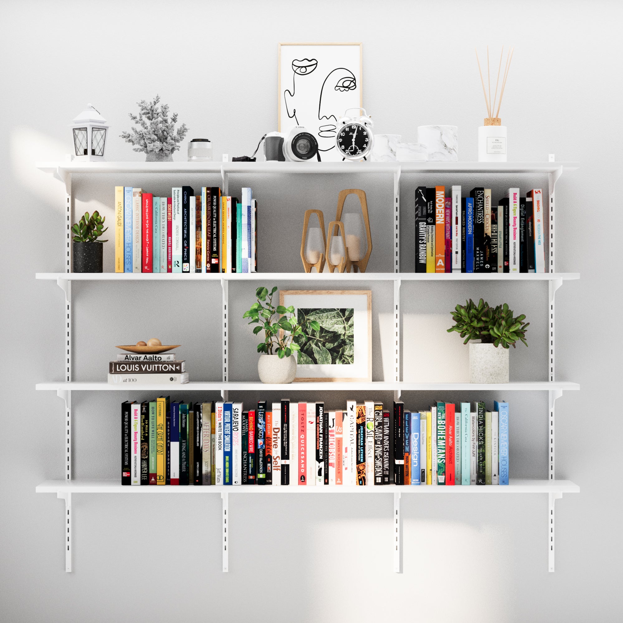 A 4-tier adjustable white wall book shelf filled with colorful books, modern art, and neutral-toned decor. Ideal for minimal and organized home setups.