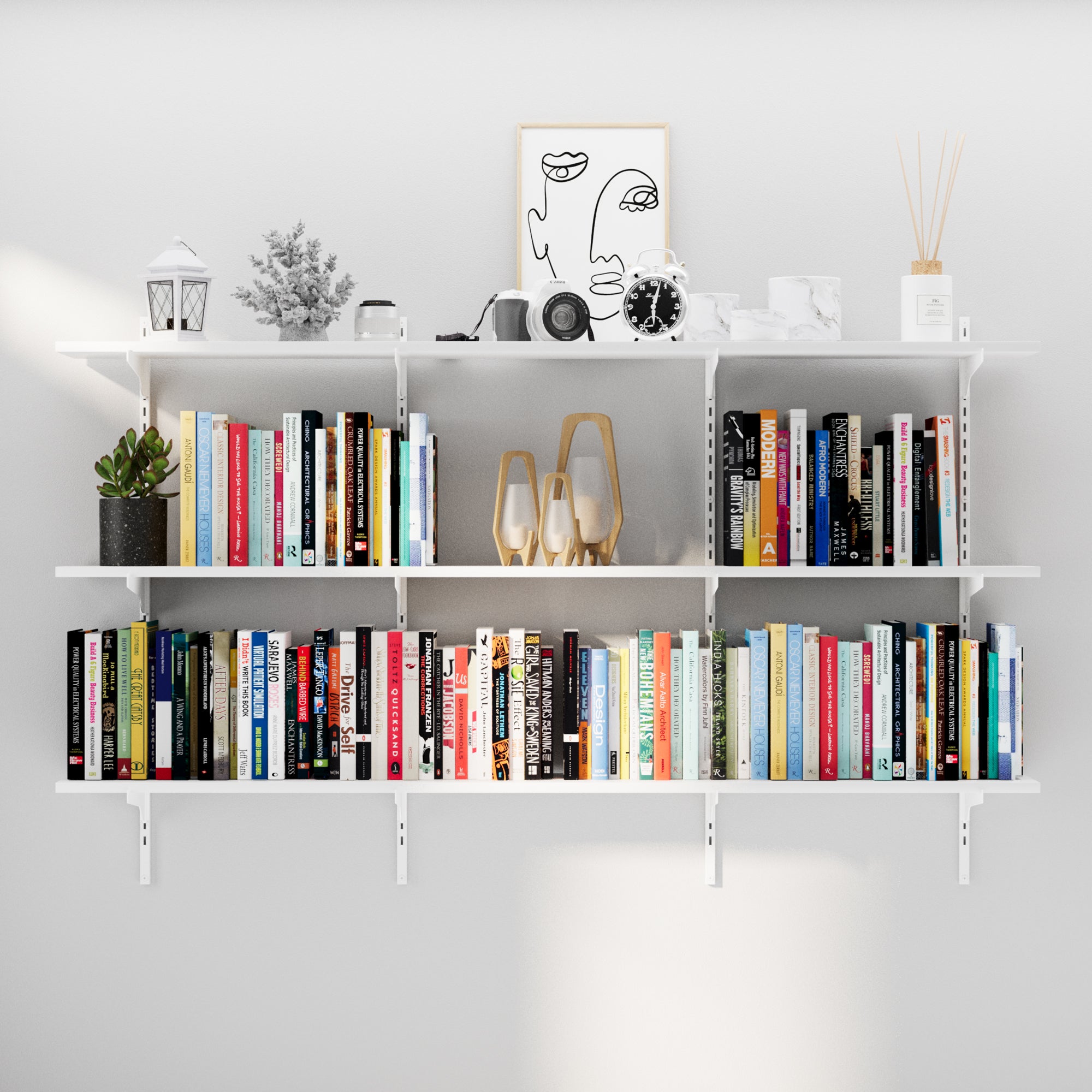 A modern 3-tier wall-mounted bookshelf with white adjustable brackets displaying books and decor items, showcasing its full design and storage potential in a bright living space.