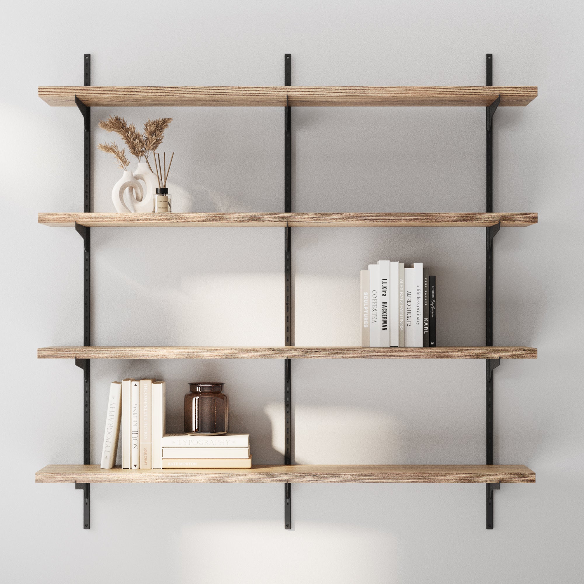4 tier floating wood shelves with books and decor items against a white wall