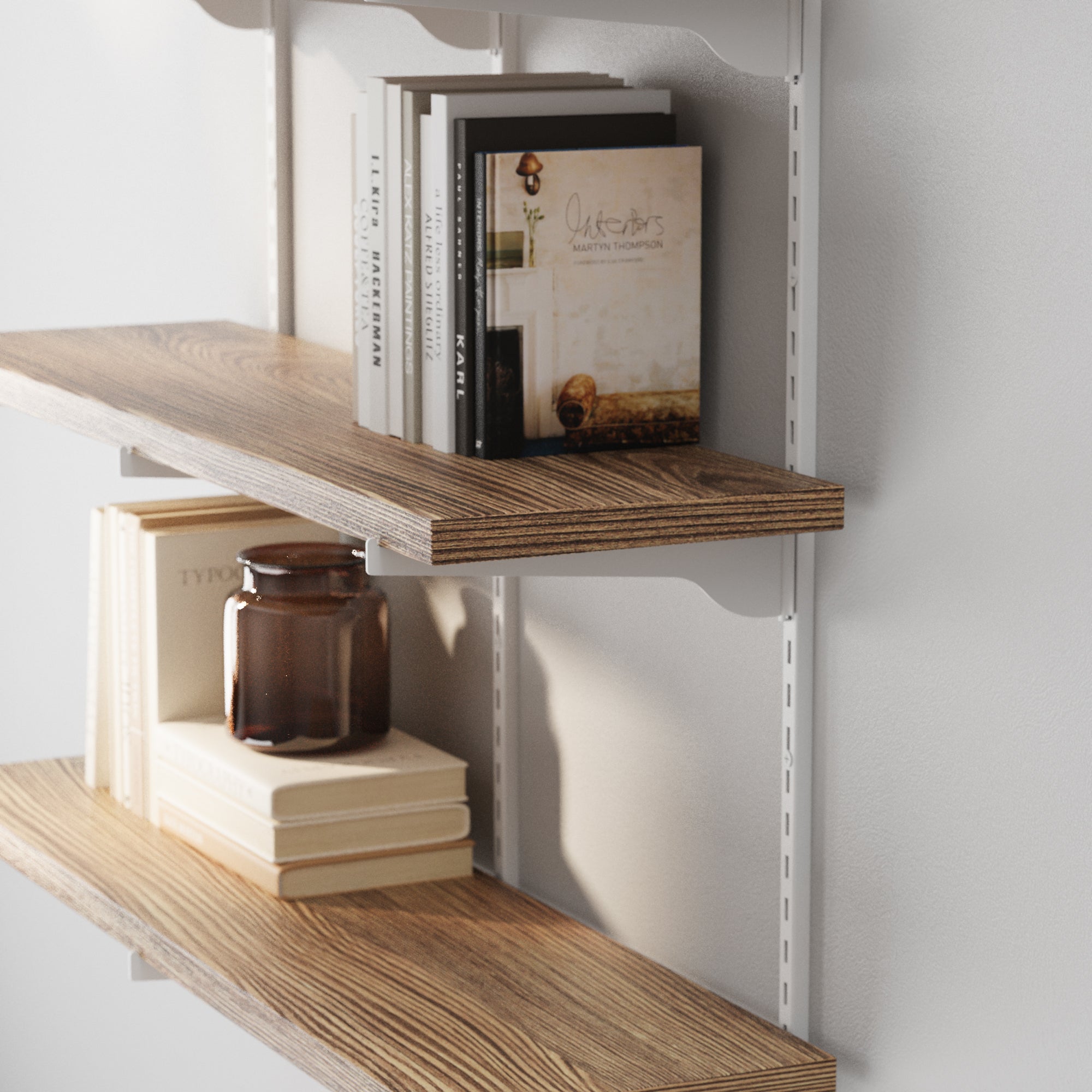 Wooden shelves for farmhouse decor and home organization with books and a jar on a white wall