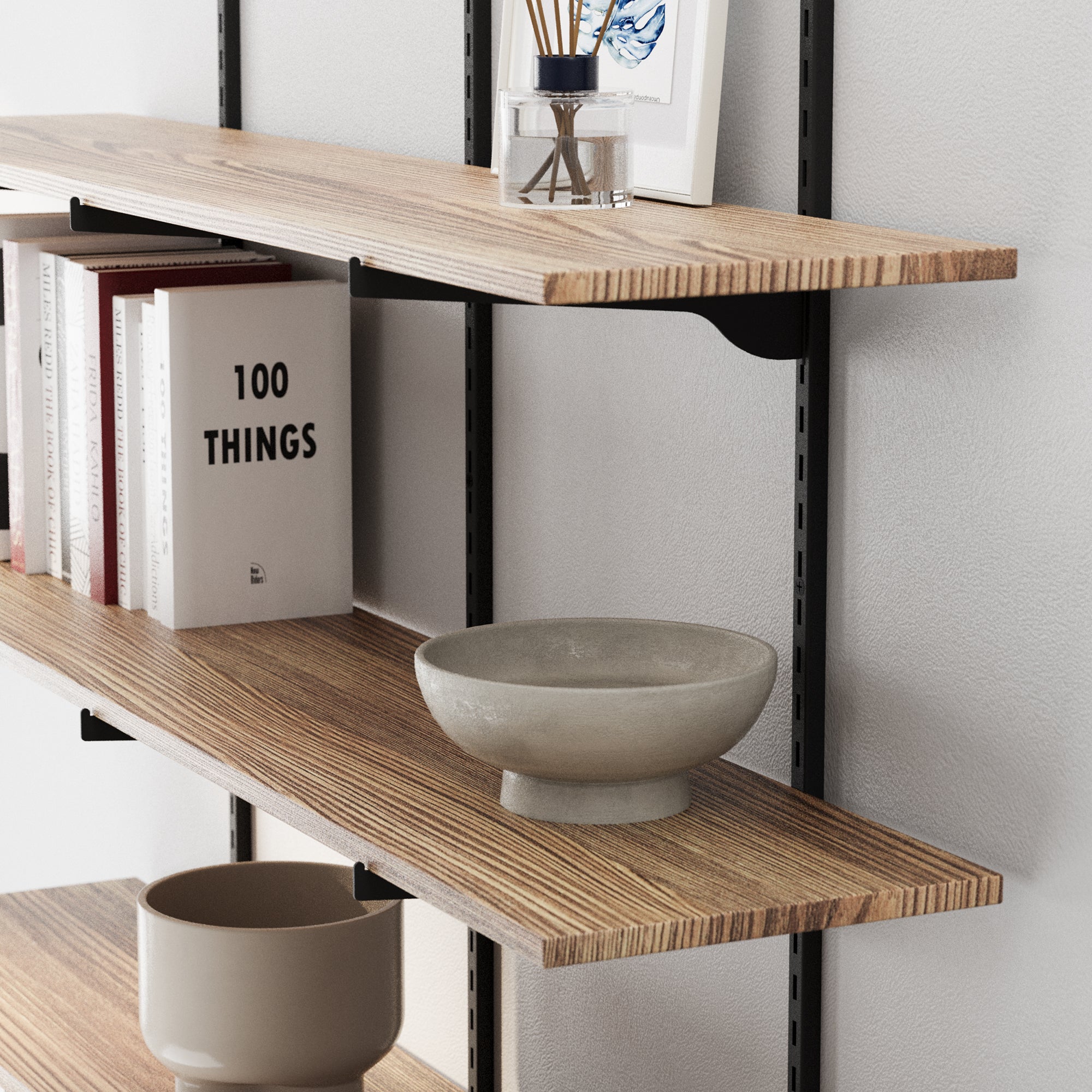 Rustic decorative shelves with decorative items against a white wall