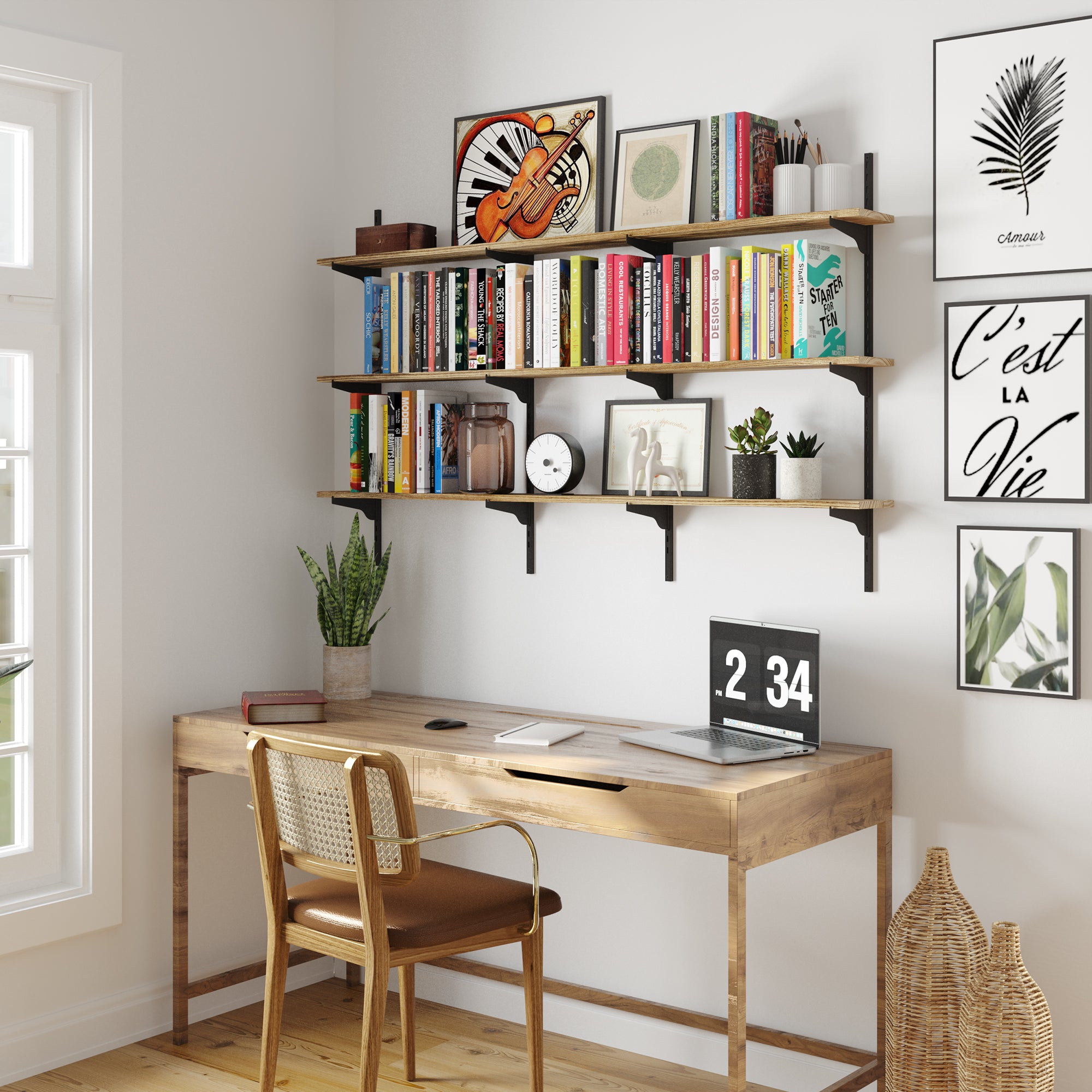 Home office with wooden desk, chair, and 3 tier office supplies shelf against a white wall.