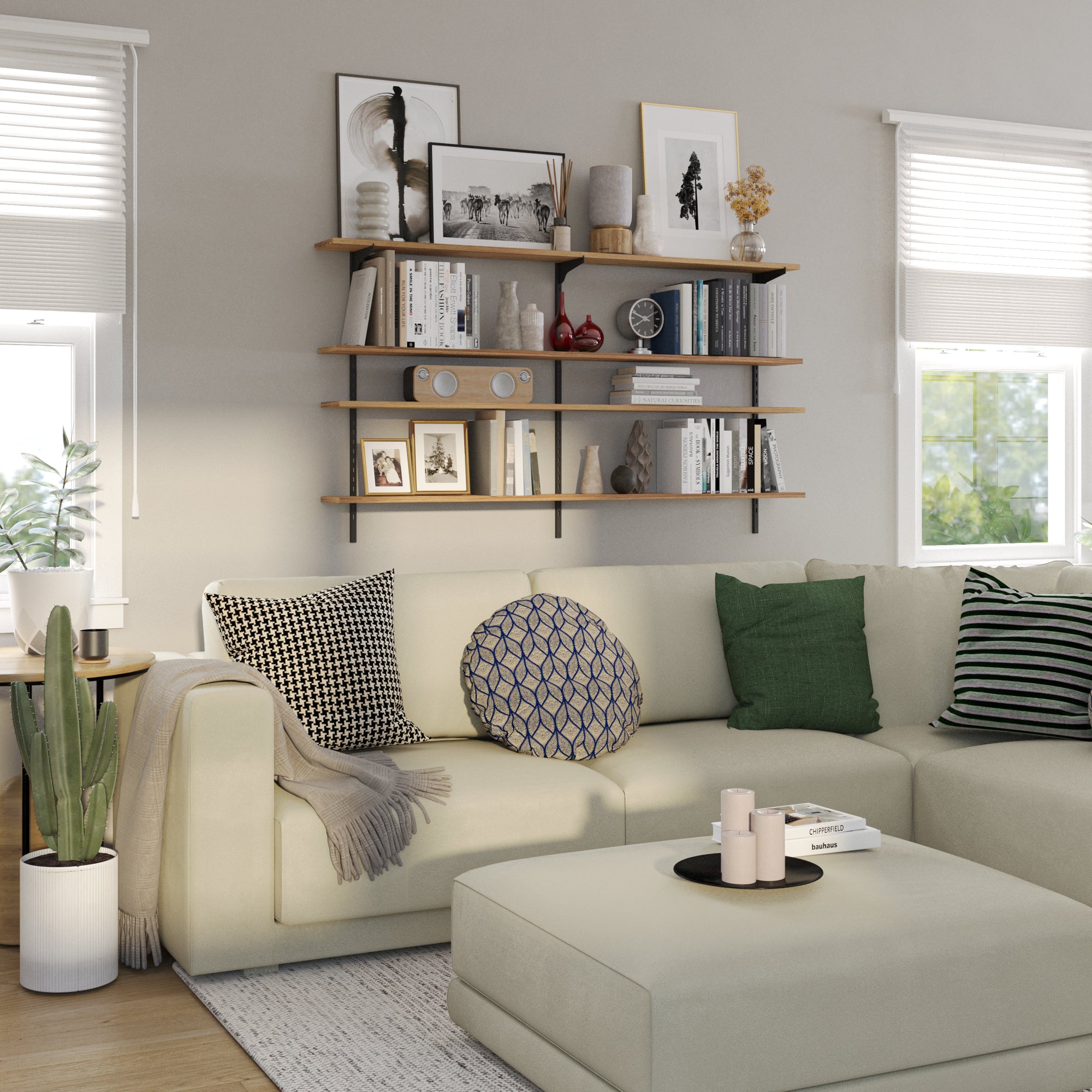 Modern living room with a beige sofa, decorative pillows, and a French country style living room bookshelf.