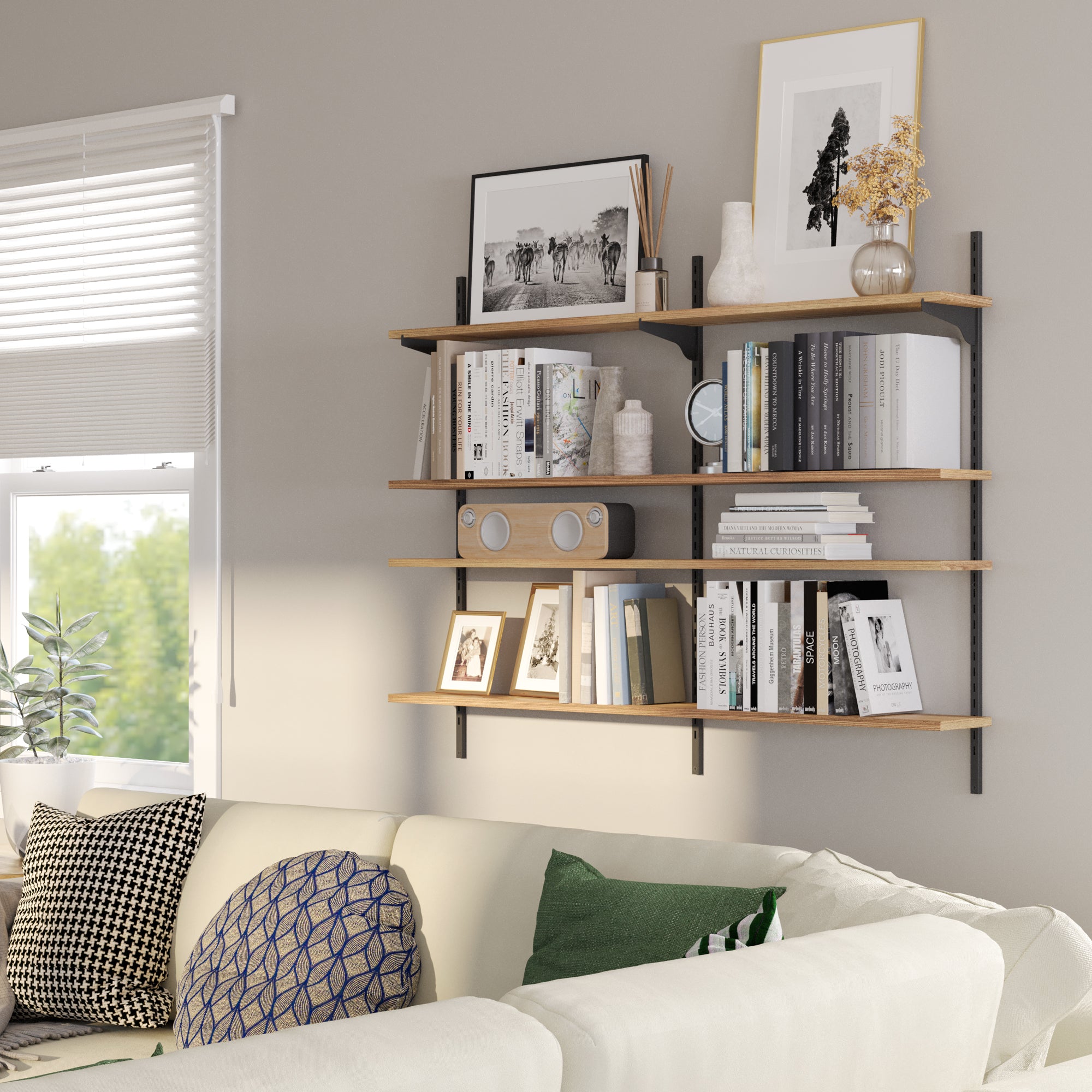 Wall-mounted bookshelf with decorative items in a living room setting