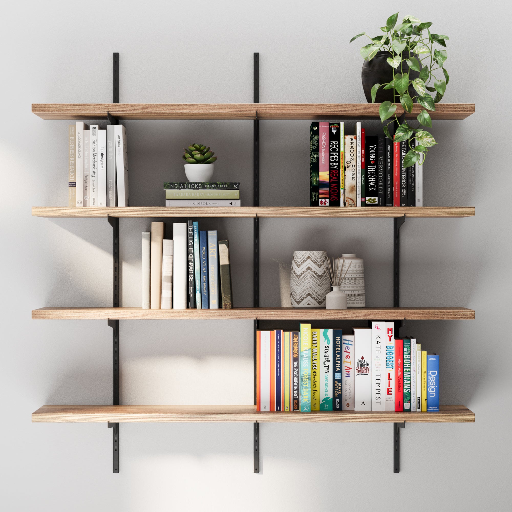 Modern interior display showing four tiered floating shelves for living room decor with black brackets and wood finish, arranged with books, plants, and decorative accents.