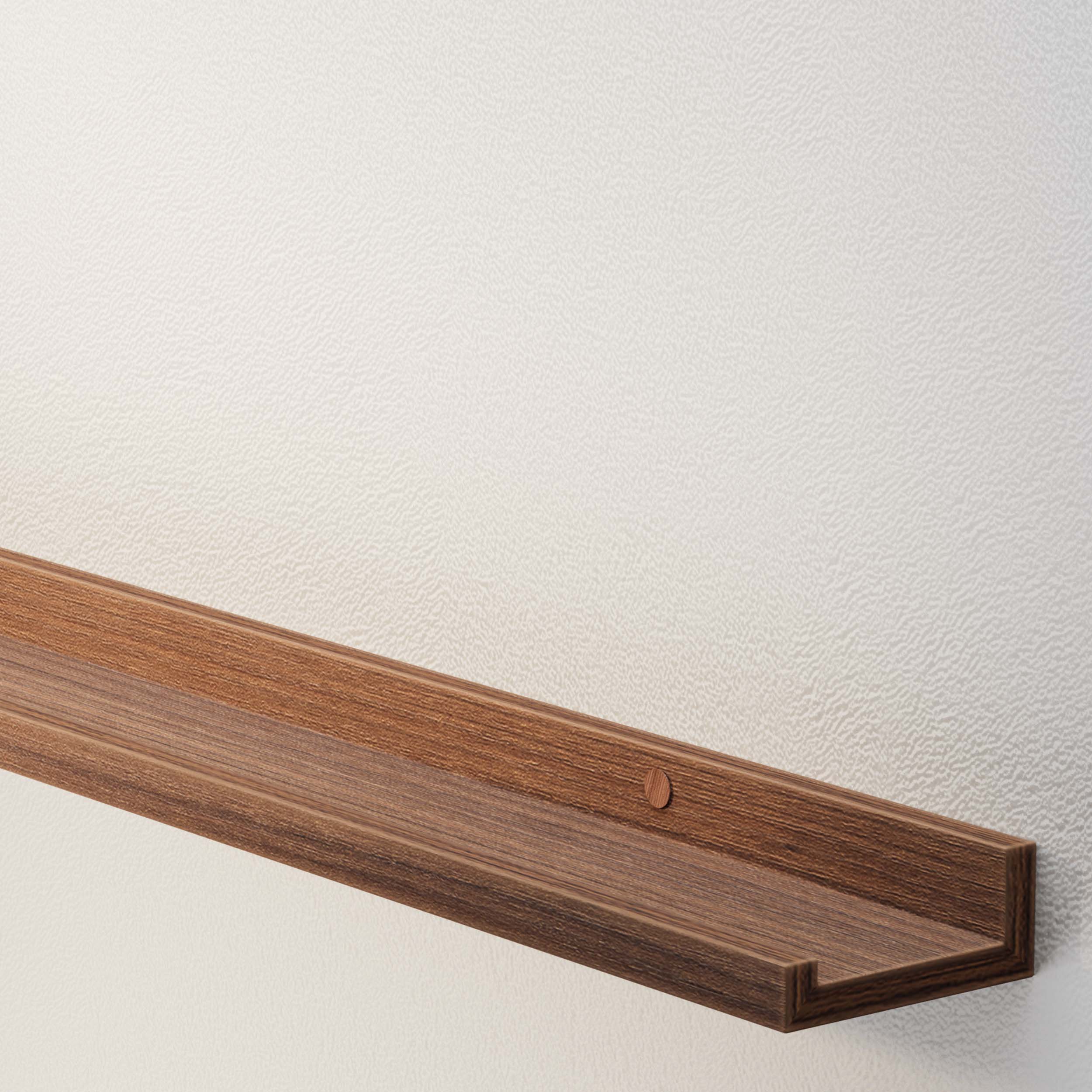An empty long shelf for wall walnut against a textured wall, showcasing the ledge's simplicity and clean design.