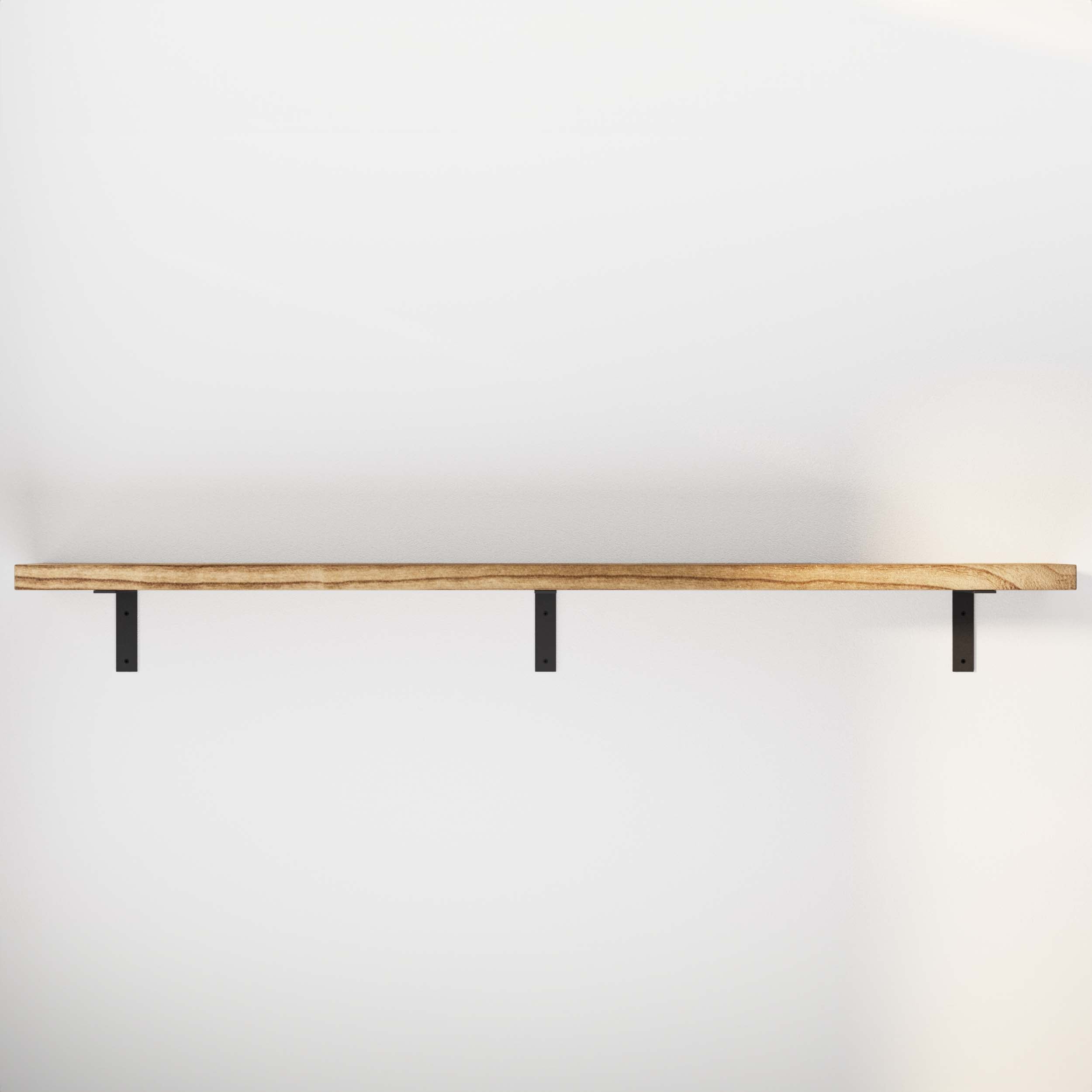 An empty wooden shelf showcasing its texture and simple, functional design.