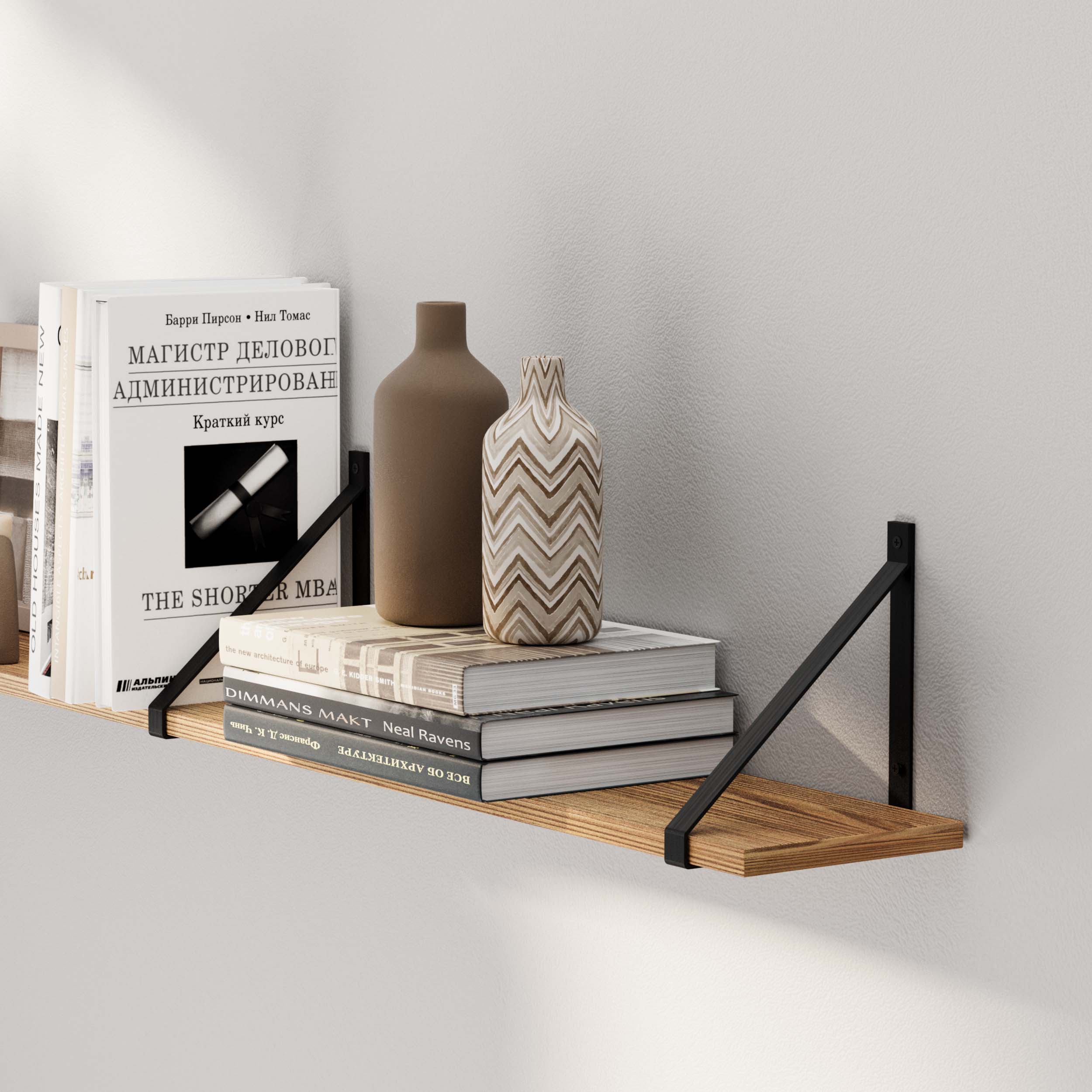 Minimalist rustic shelf burnt with books and elegant vases, against a textured wall.