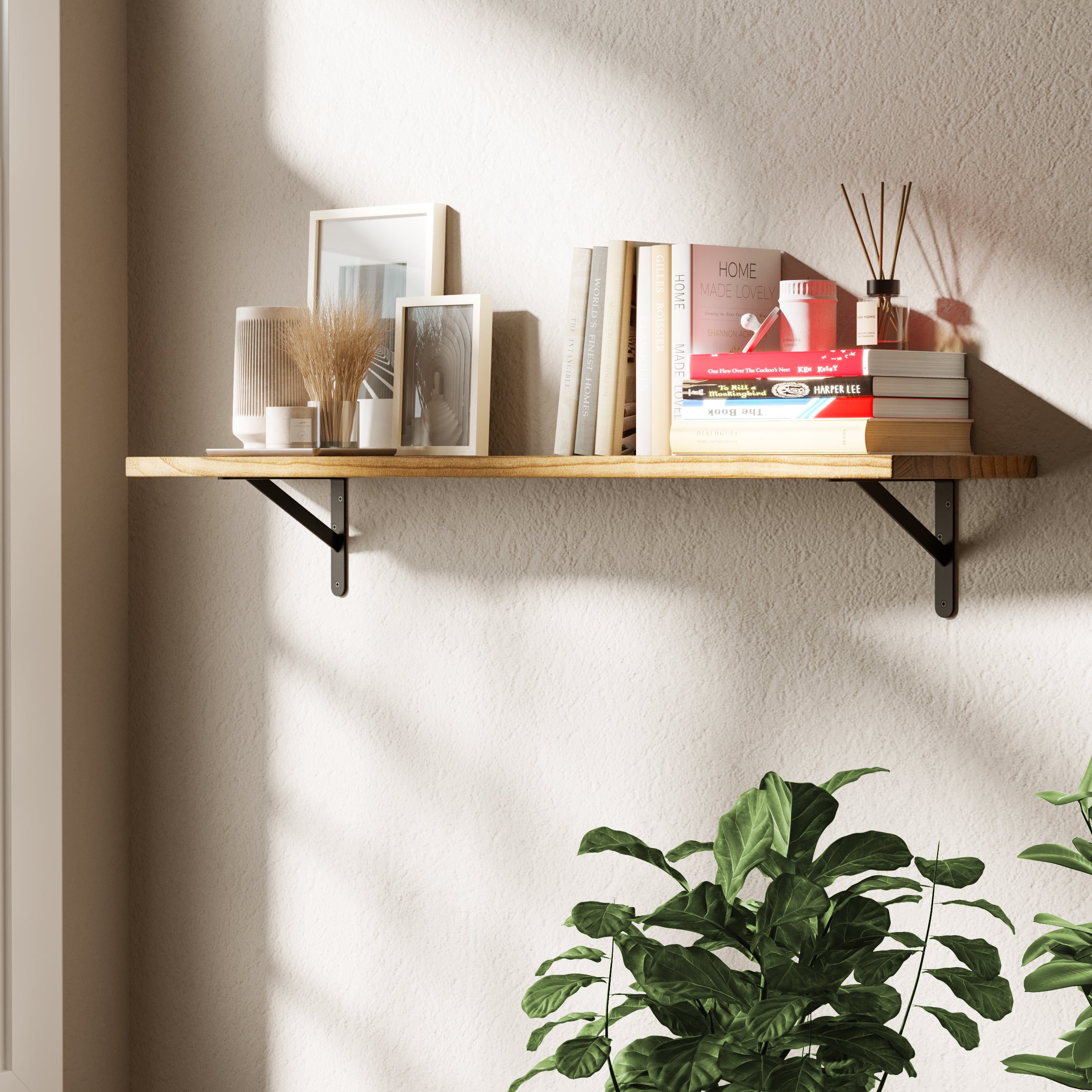 A decorative setup on a rustic book shelf wall mounted, featuring vintage books, and artistic frames. Highlights a detailed, rustic design suitable for modern interiors.