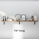 A minimalist 72 inch extra long floating shelf with black metal brackets. Styled with Matisse artwork, books, and decor, blending elegance and functionality for living spaces.