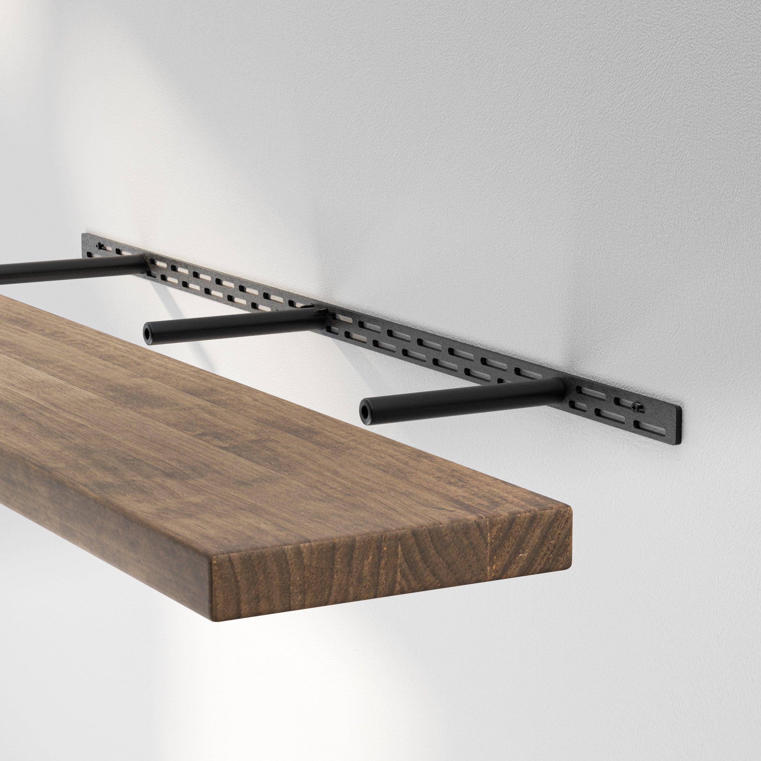 Hidden bracket mechanism shows the sturdy metal support system used to achieve a clean, modern floating shelf design.