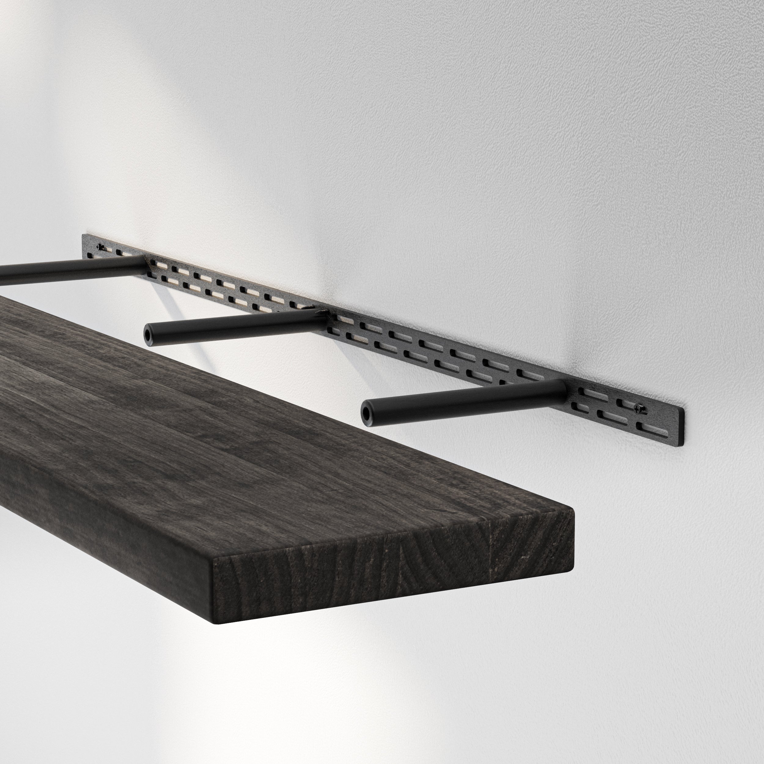 Dark-stained wooden shelf being mounted with a hidden bracket system, highlighting the sturdy steel structure for a secure, invisible wall-mount design.