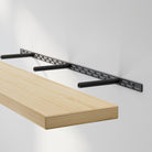 Hidden mounting bracket system demonstrates the shelf’s solid build and easy installation—highlighting the strong black metal support and natural wood grain of the board.